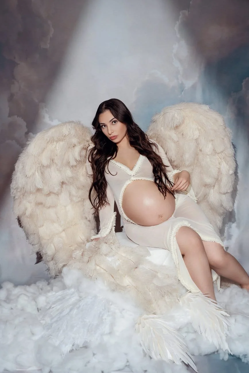 Maternity portrait session with pregnant angel on clouds in Chicago - Filaneyka photo studio