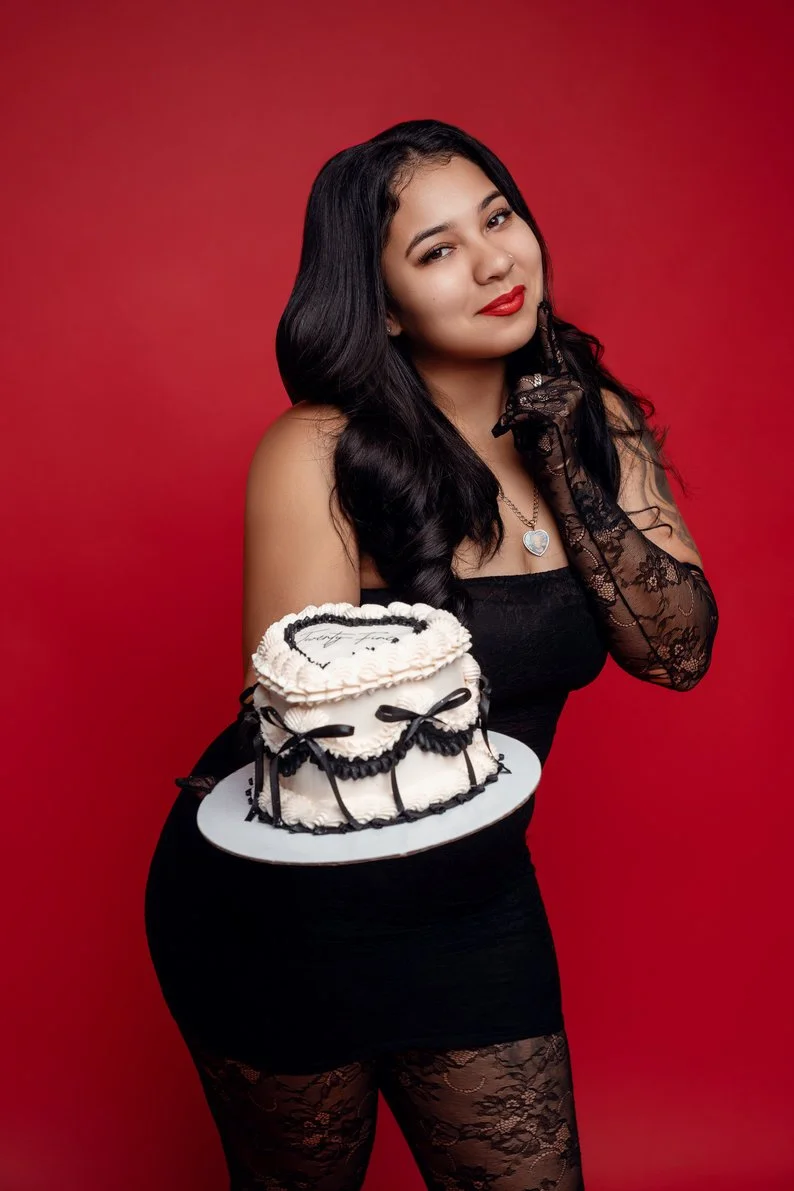 Birthday photography session with woman holding heart-shaped cake in Chicago - Filaneyka photo studio