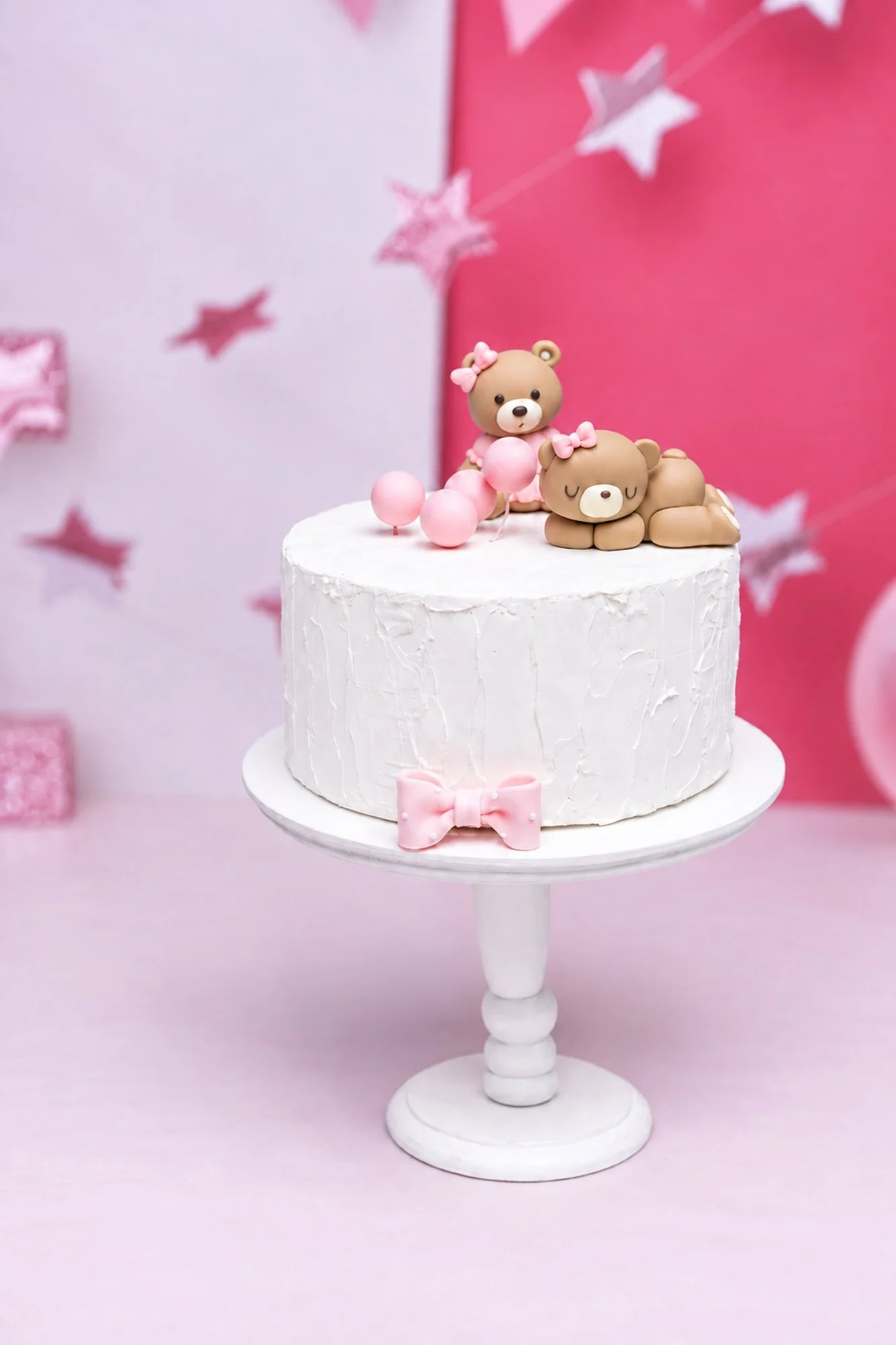  Clean white prop cake used for a mess-free cake smash alternative at a downtown Chicago photo studio 