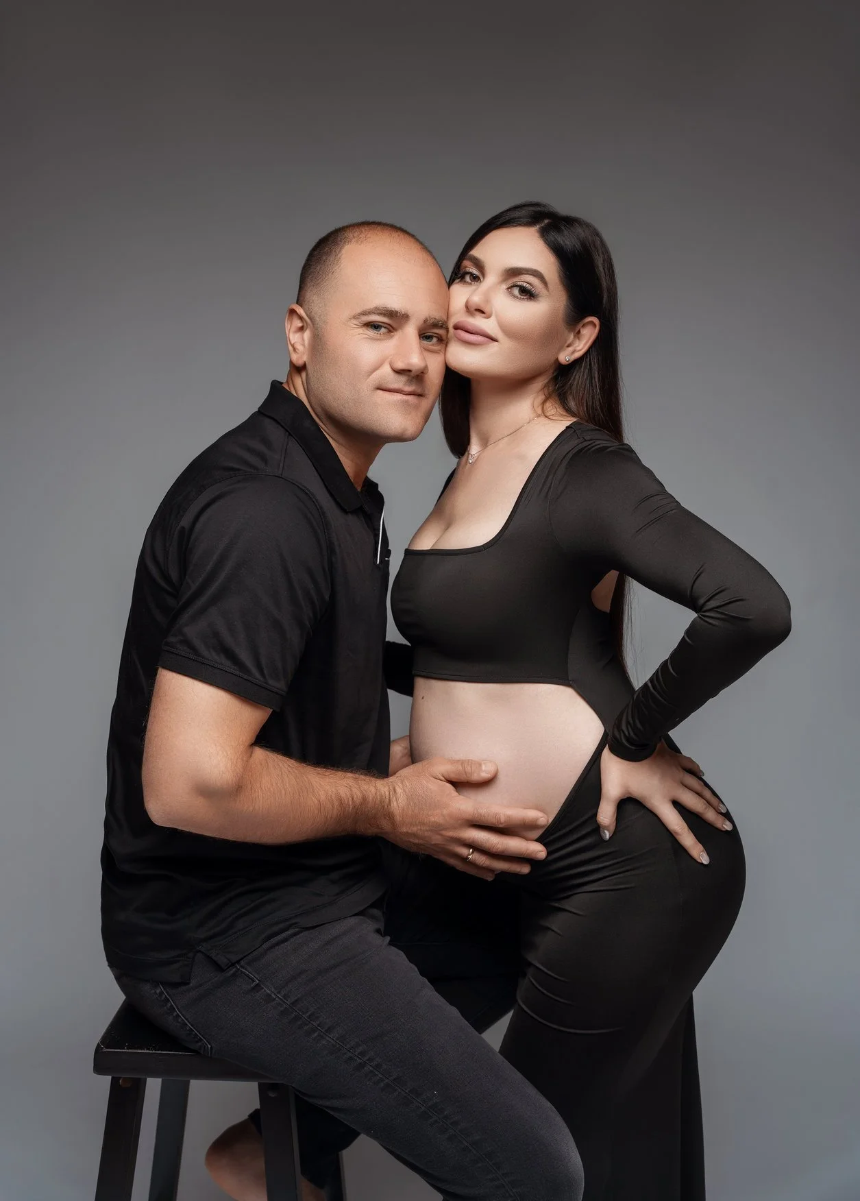 Expecting mother photoshoot with couple in black maternity portrait in Chicago - Filaneyka photo studio