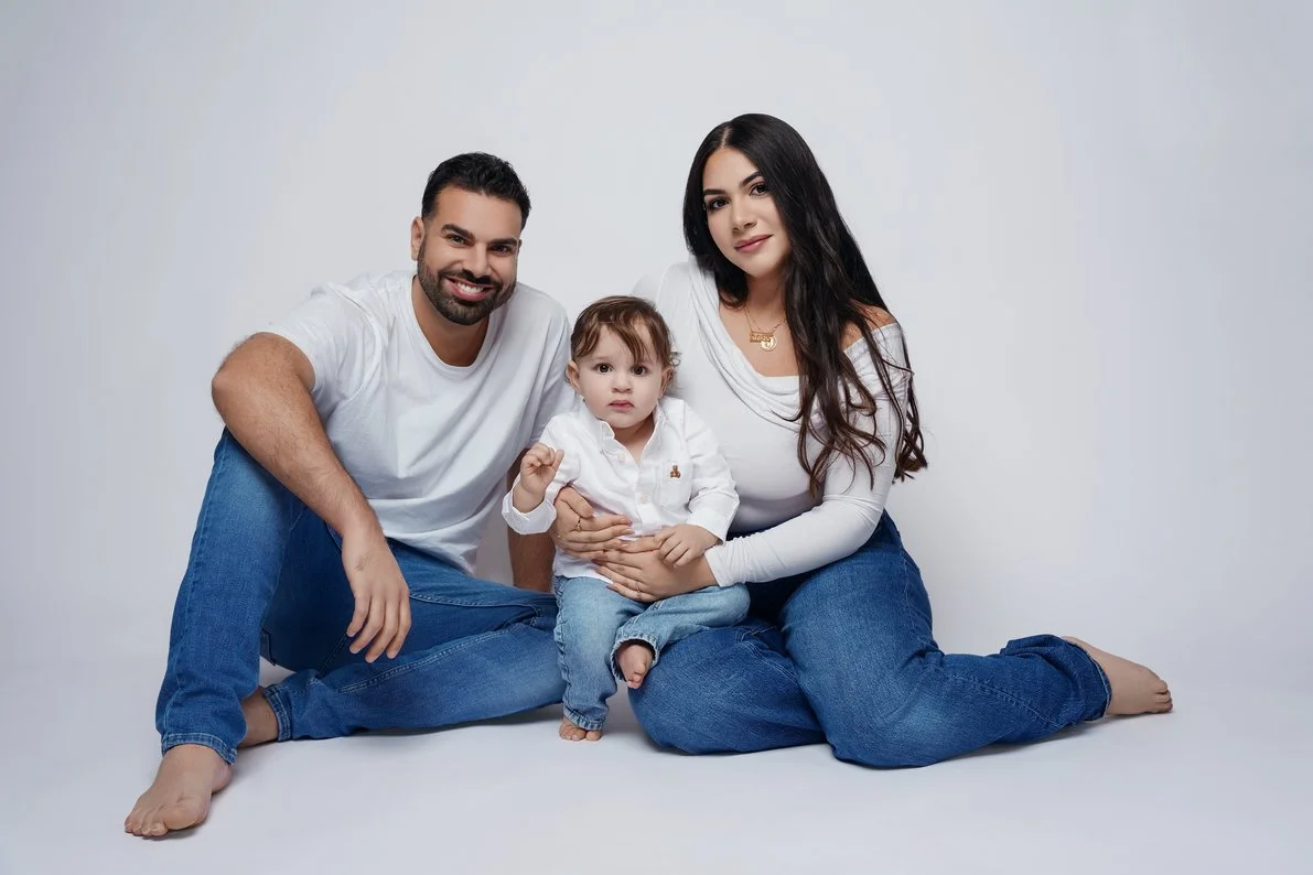 Family photography with family of three sitting casually in Chicago - Filaneyka photo studio