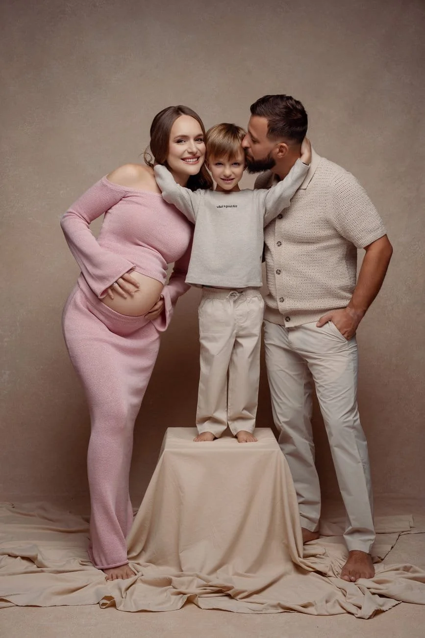 Expecting mother photoshoot with expecting family tender studio portrait in Chicago - Filaneyka photo studio