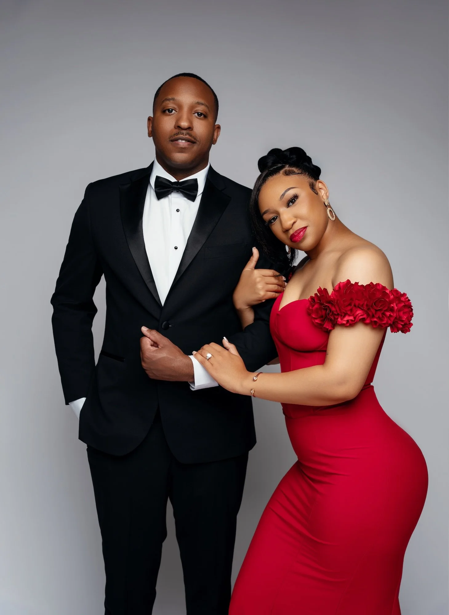 Boutique engagement session: couple posing together in the studio