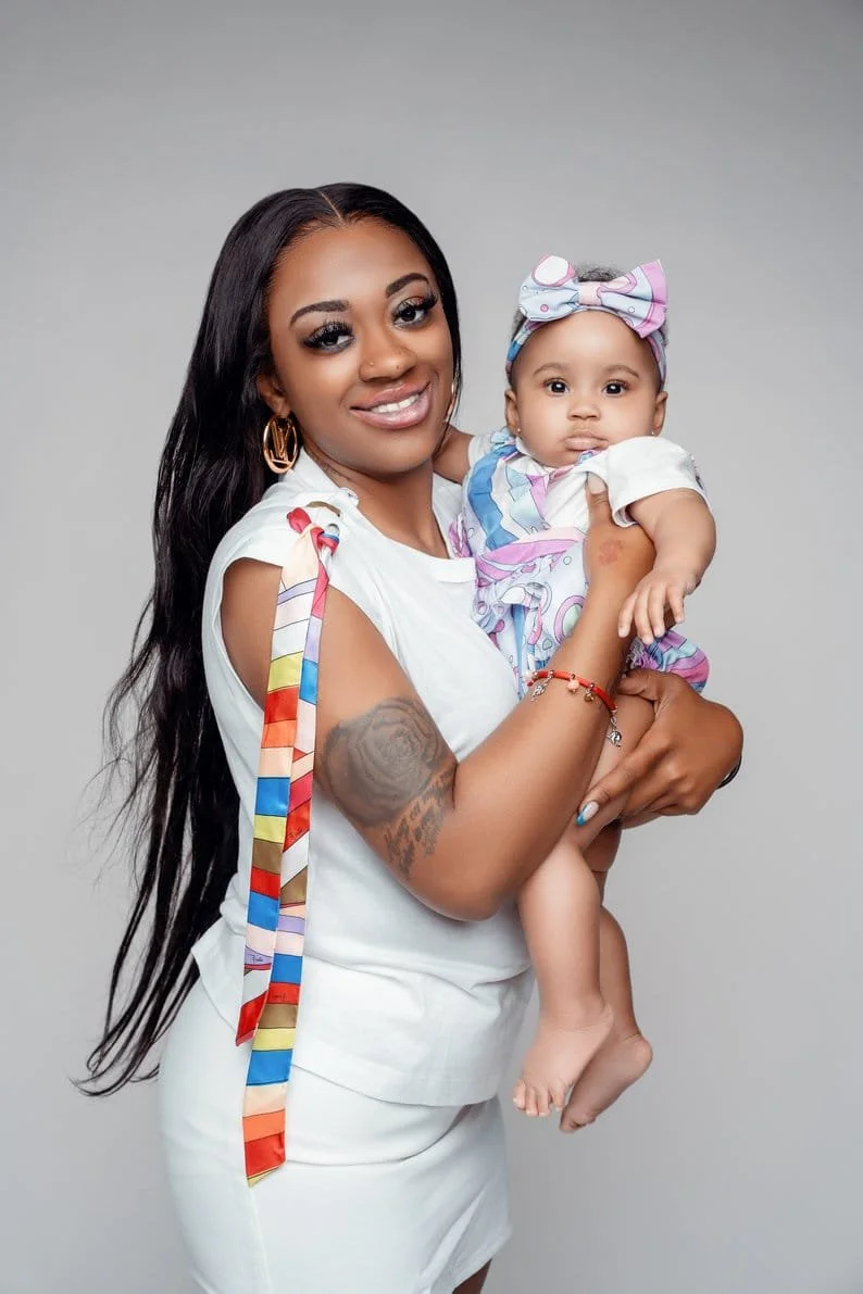 First birthday photoshoot with woman holding baby in matching outfits in Chicago - Filaneyka photo studio