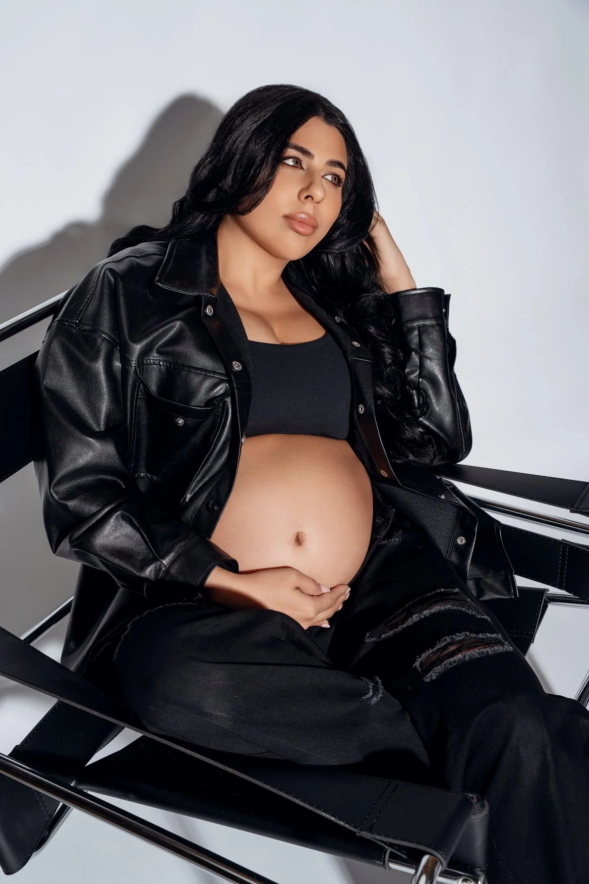 Maternity portrait session with edgy black leather maternity look in Chicago - Filaneyka photo studio