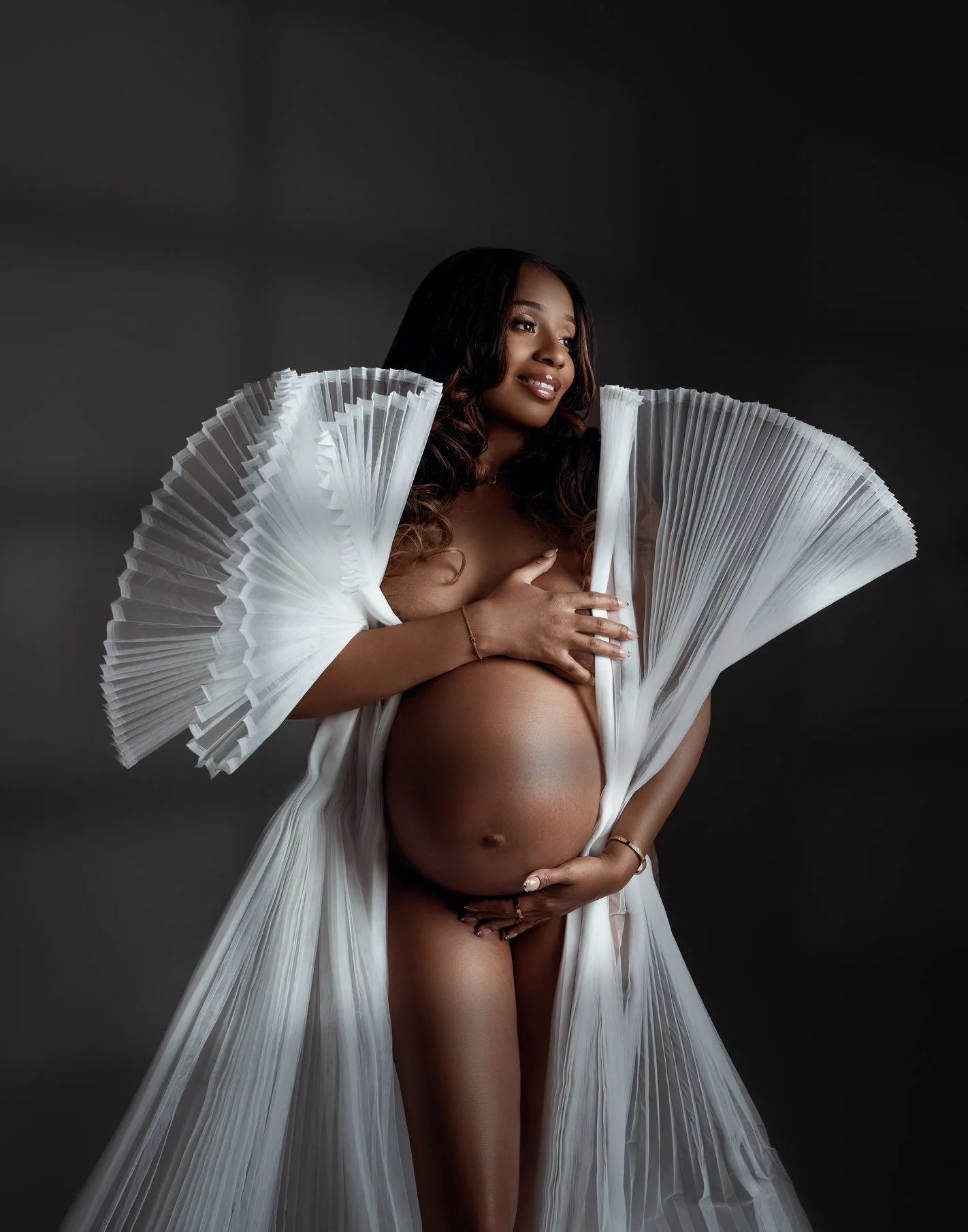 Prenatal photography session with dramatic white pleated cape in Chicago - Filaneyka photo studio