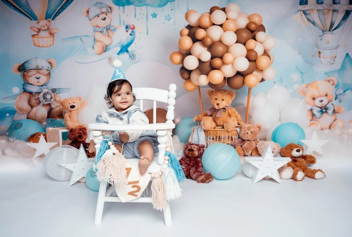 Cake smash session with baby in highchair with teddy bear theme in Chicago - Filaneyka photo studio
