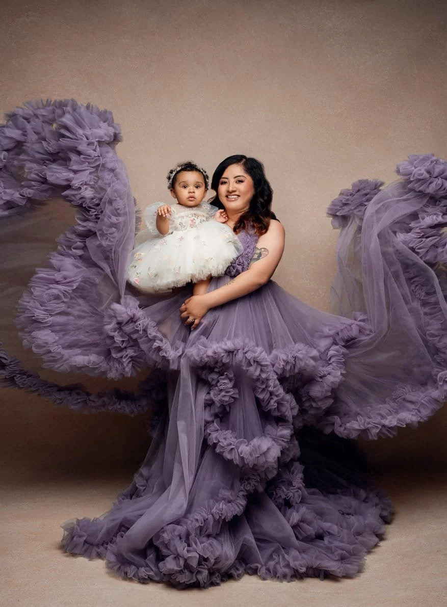 Family portrait session with mother holding baby in flowing purple in Chicago - Filaneyka photo studio