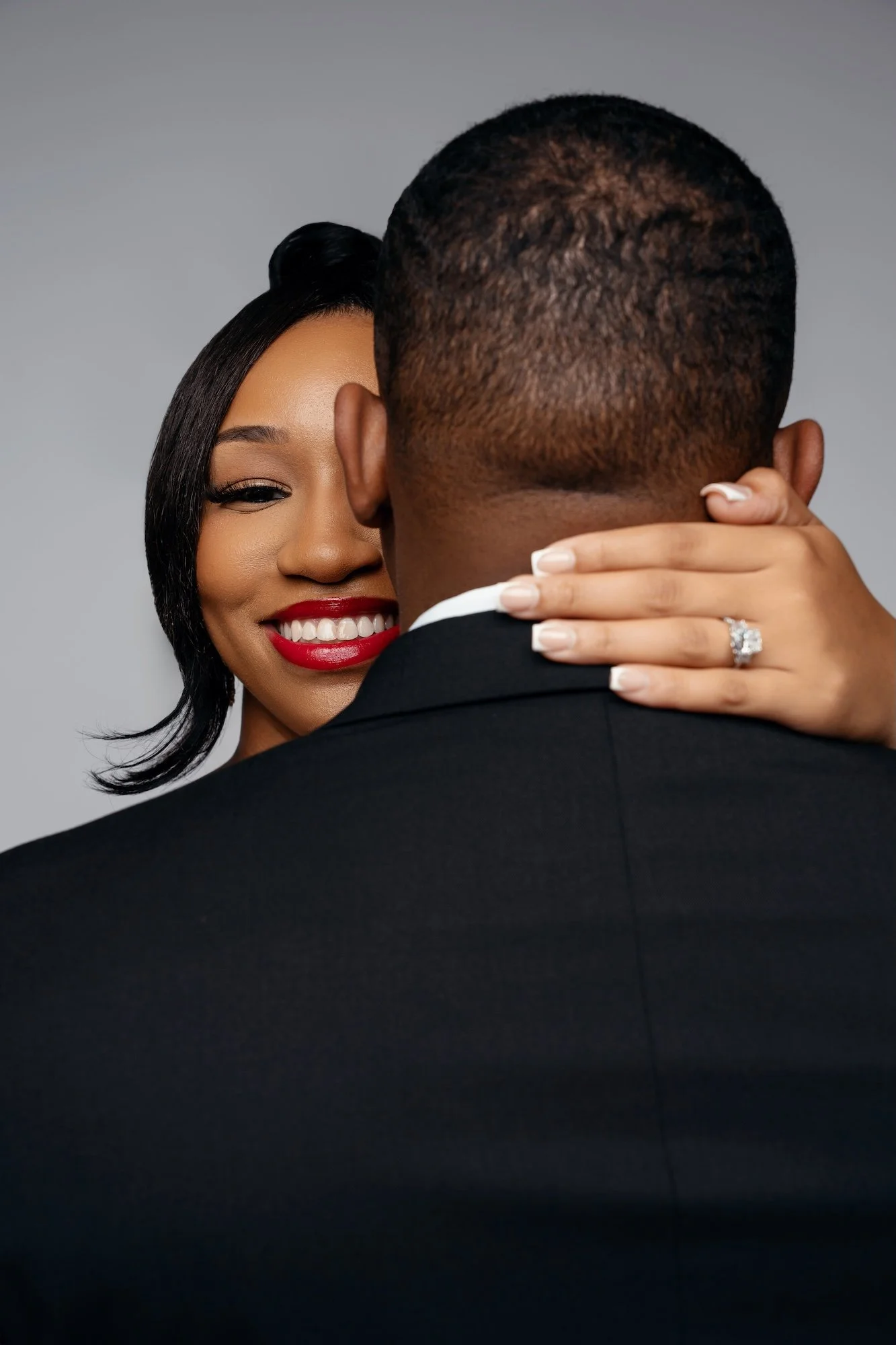 Luxury engagement session: couple in a classic studio portrait