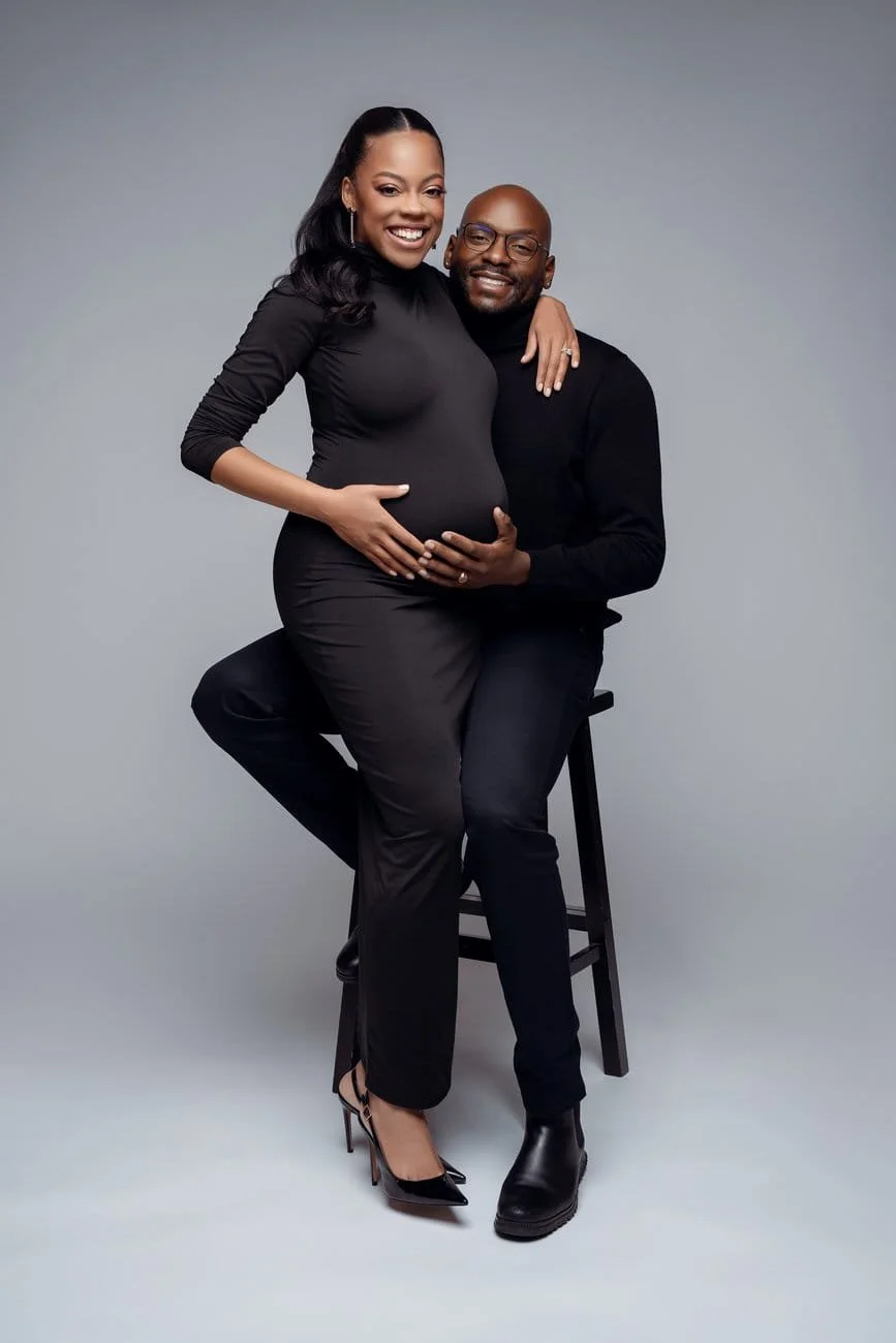 Pregnancy photography with happy couple embracing baby bump in Chicago - Filaneyka photo studio