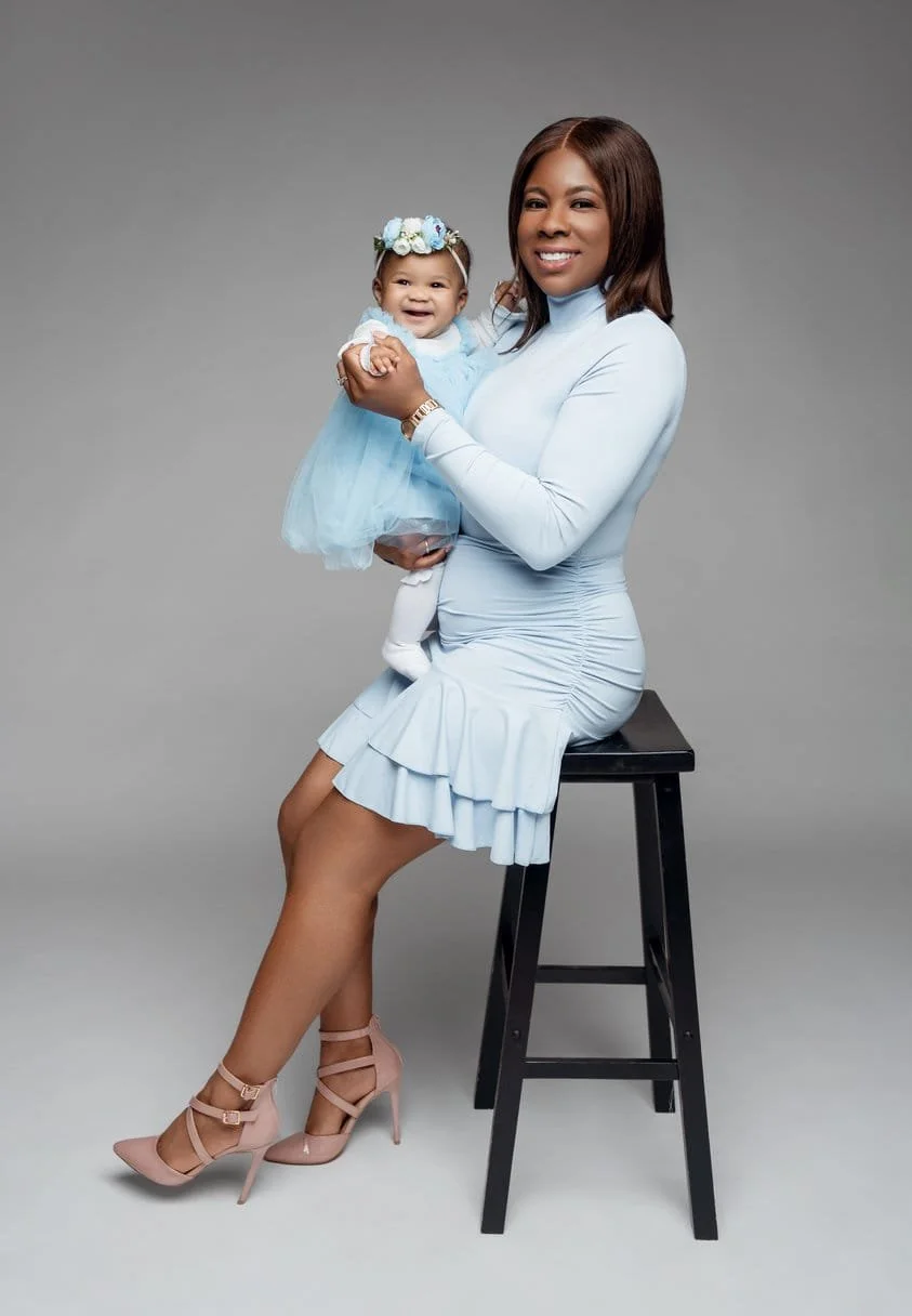 First birthday photoshoot with mother holding baby in matching blue in Chicago - Filaneyka photo studio