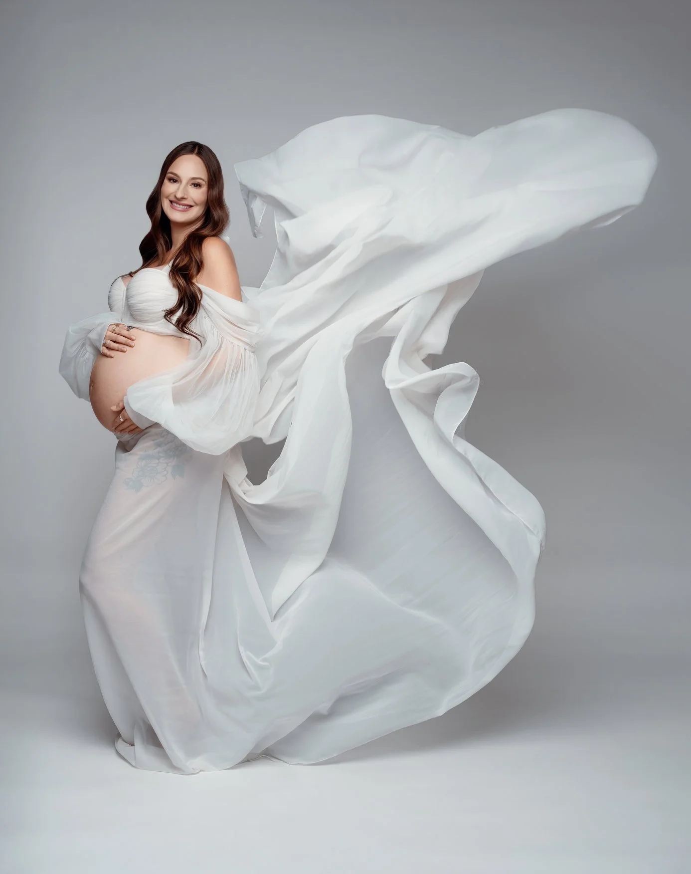 Prenatal photography session with white flowing fabric maternity portrait in Chicago - Filaneyka photo studio
