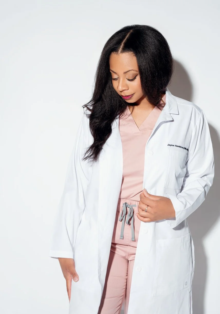 Business portrait photography with white lab coat with pink scrubs in Chicago - Filaneyka photo studio
