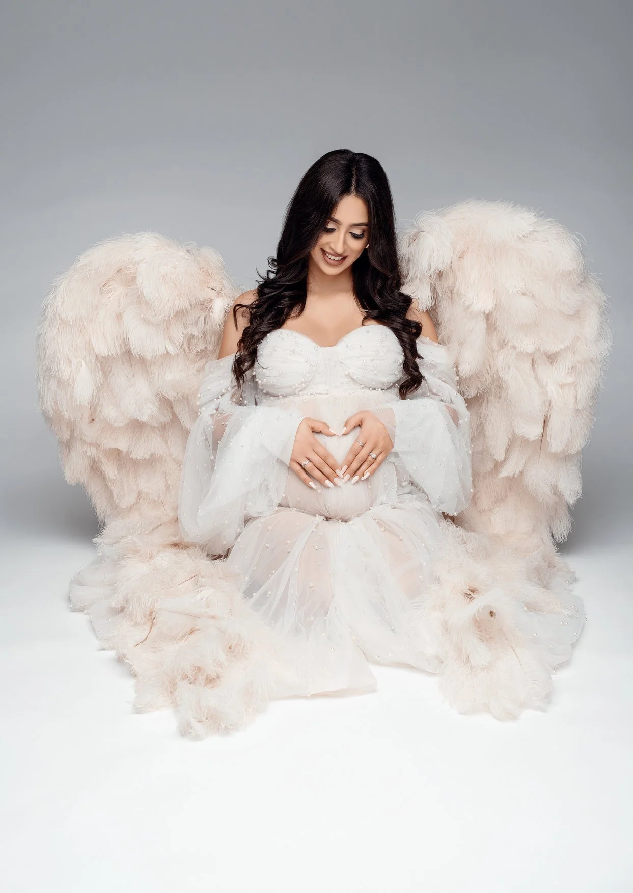 Pregnancy photography with angel wings maternity portrait in Chicago - Filaneyka photo studio