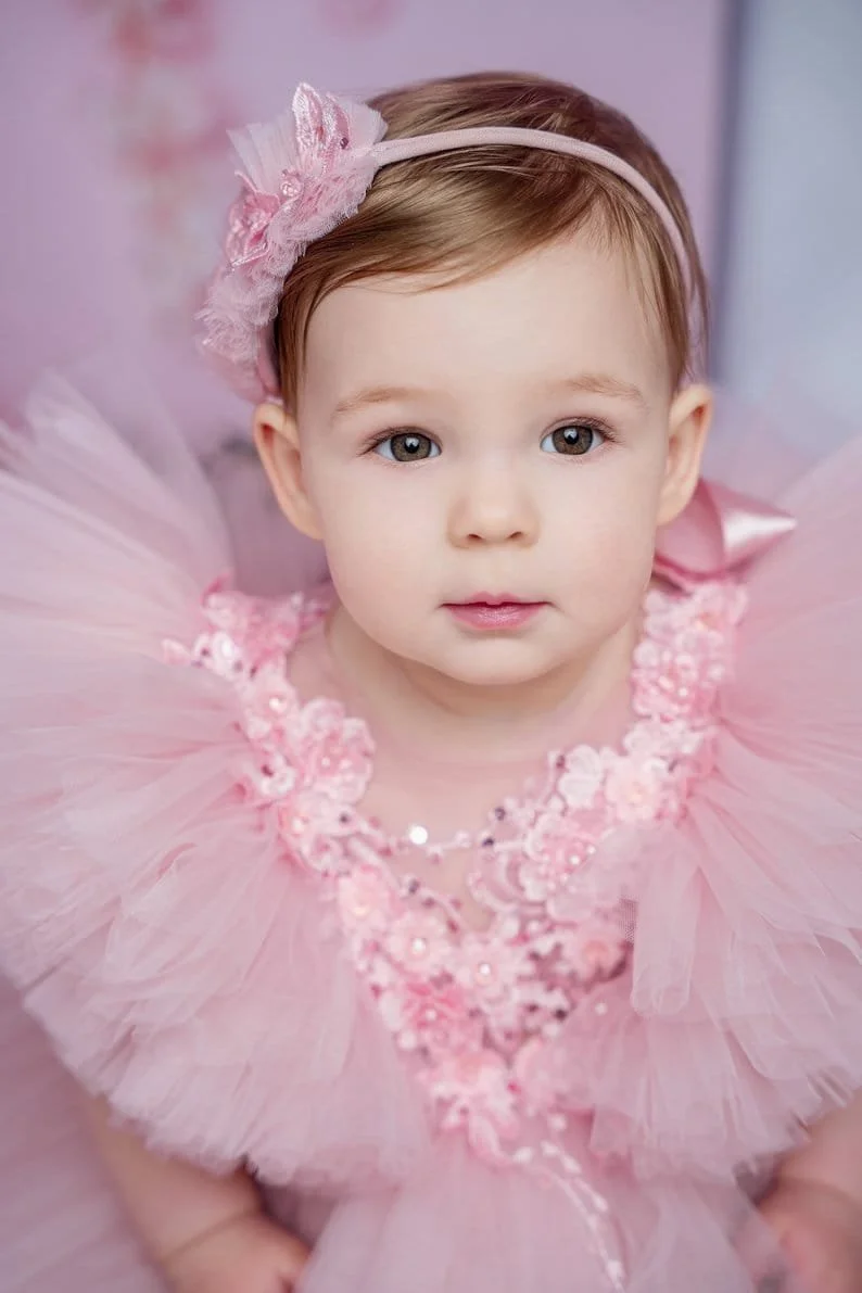 1st birthday photography with toddler girl closeup in pink tutu portrait in Chicago - Filaneyka photo studio