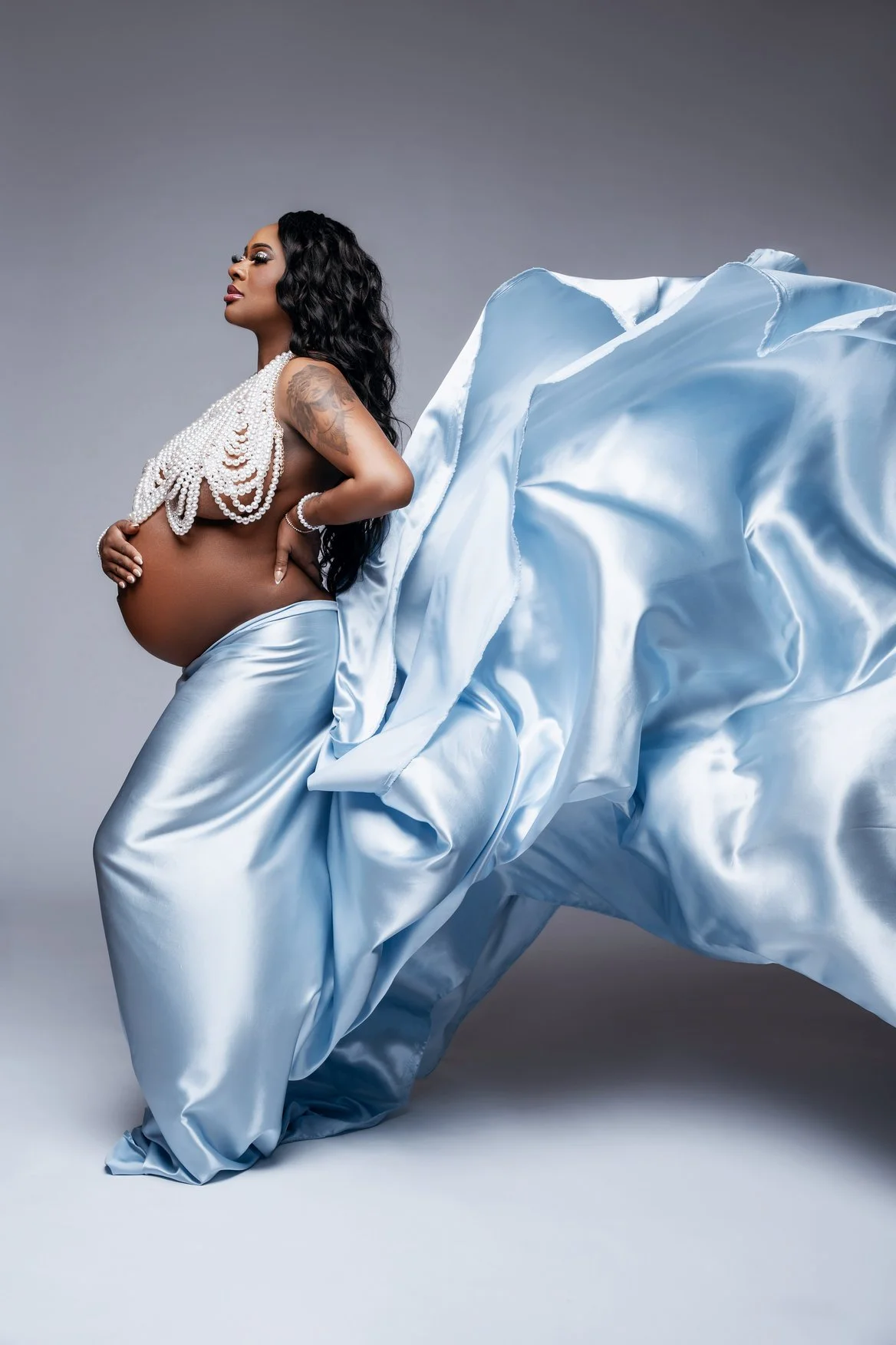 Maternity portrait session with flowing blue satin maternity shoot in Chicago - Filaneyka photo studio