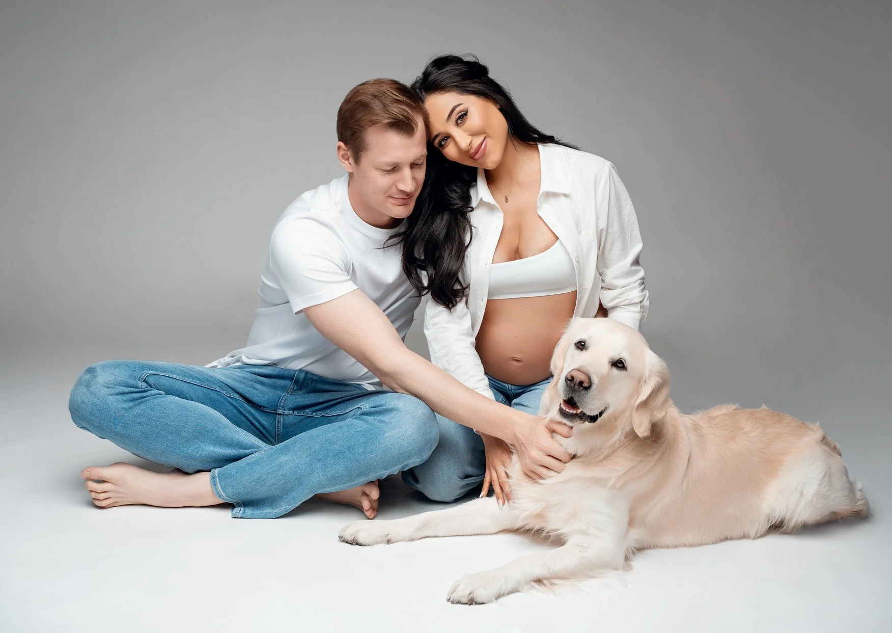 Prenatal photography session with couple petting dog maternity casual in Chicago - Filaneyka photo studio