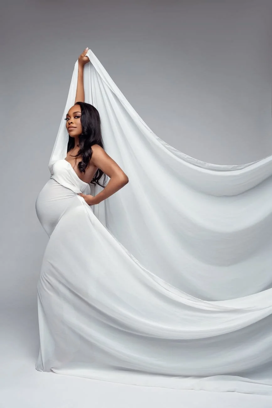 Expecting mother photoshoot with flowing white fabric maternity pose in Chicago - Filaneyka photo studio