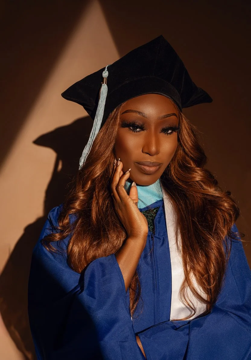 Graduation celebration photoshoot with graduate in blue cap and gown in Chicago - Filaneyka photo studio