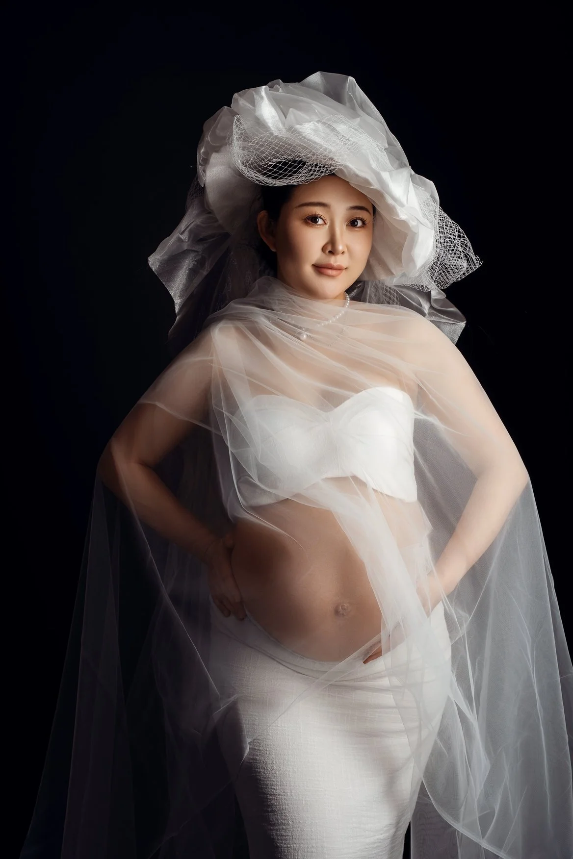 Pregnancy photography with white veiled bridal maternity portrait in Chicago - Filaneyka photo studio
