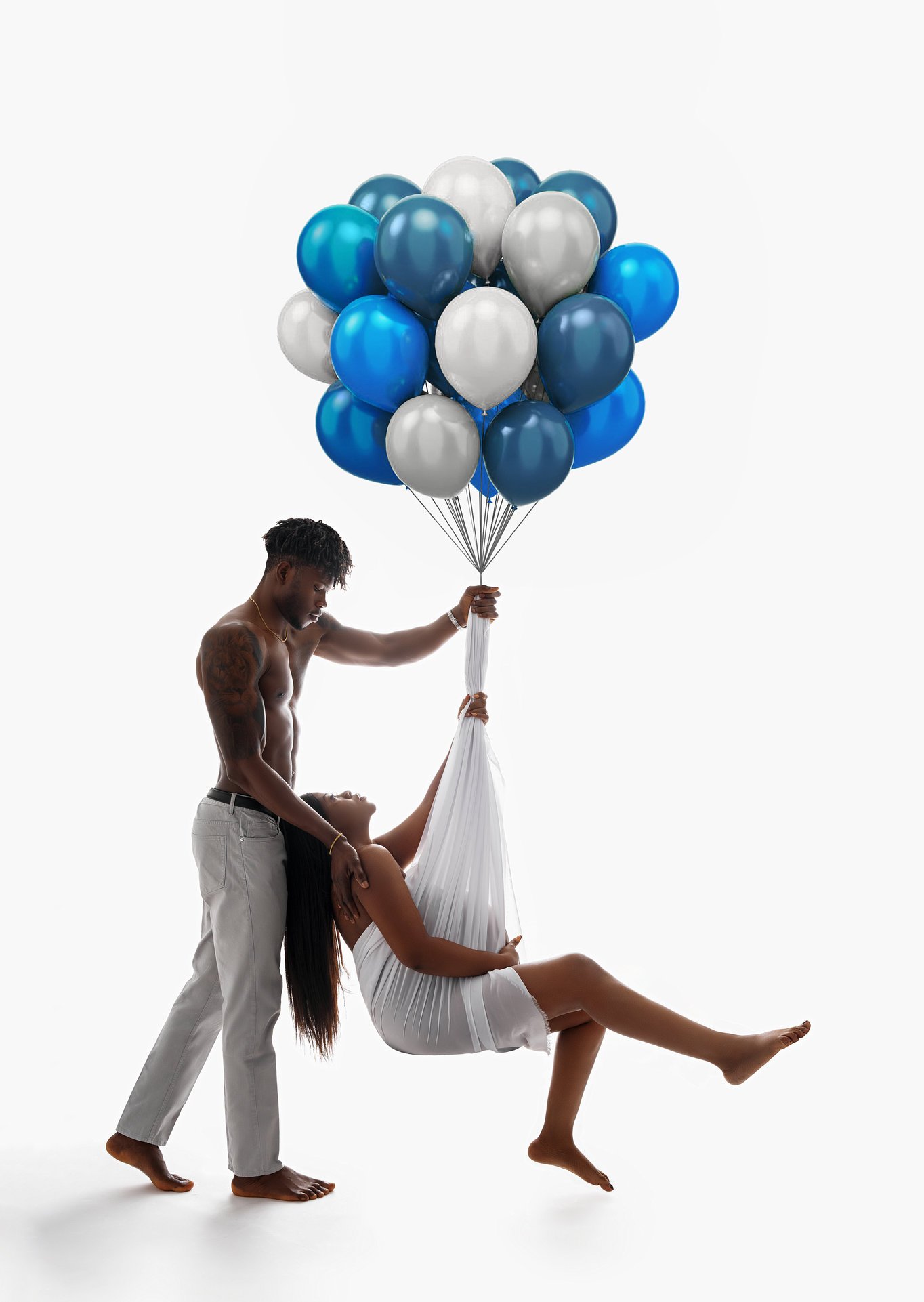 Creative maternity compositing with couple with balloons maternity shot in Chicago - Filaneyka photo studio