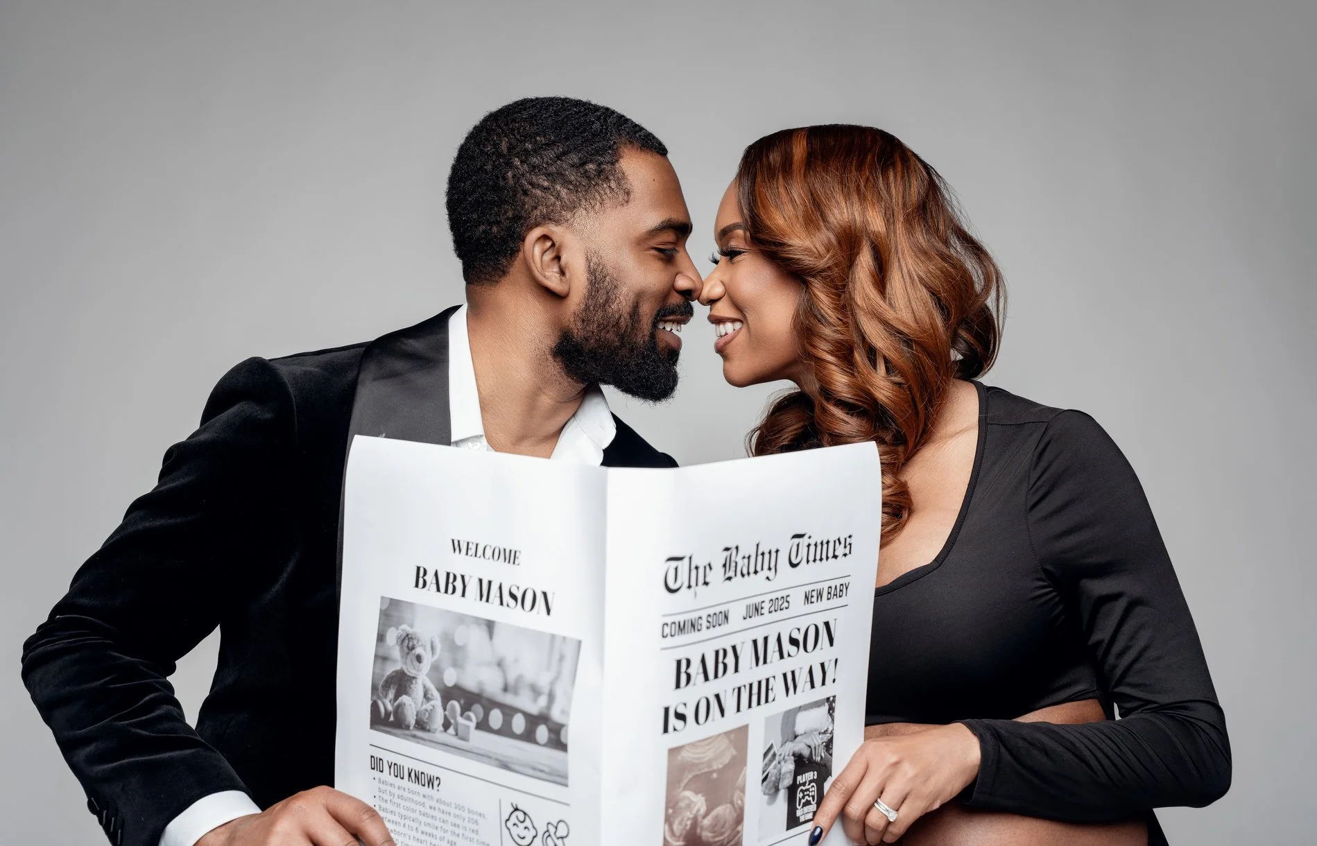Expecting mother photoshoot with couple with baby announcement newspaper in Chicago - Filaneyka photo studio