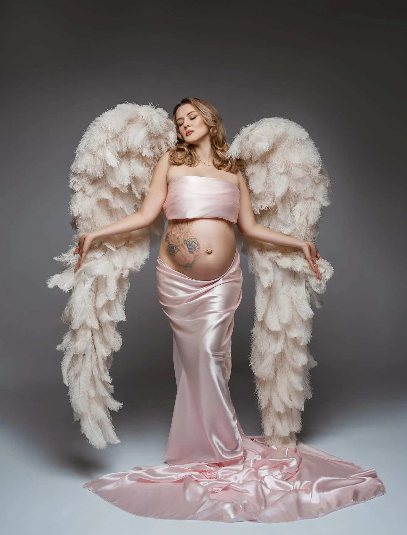 Prenatal photography session with angelic wings pink maternity in Chicago - Filaneyka photo studio