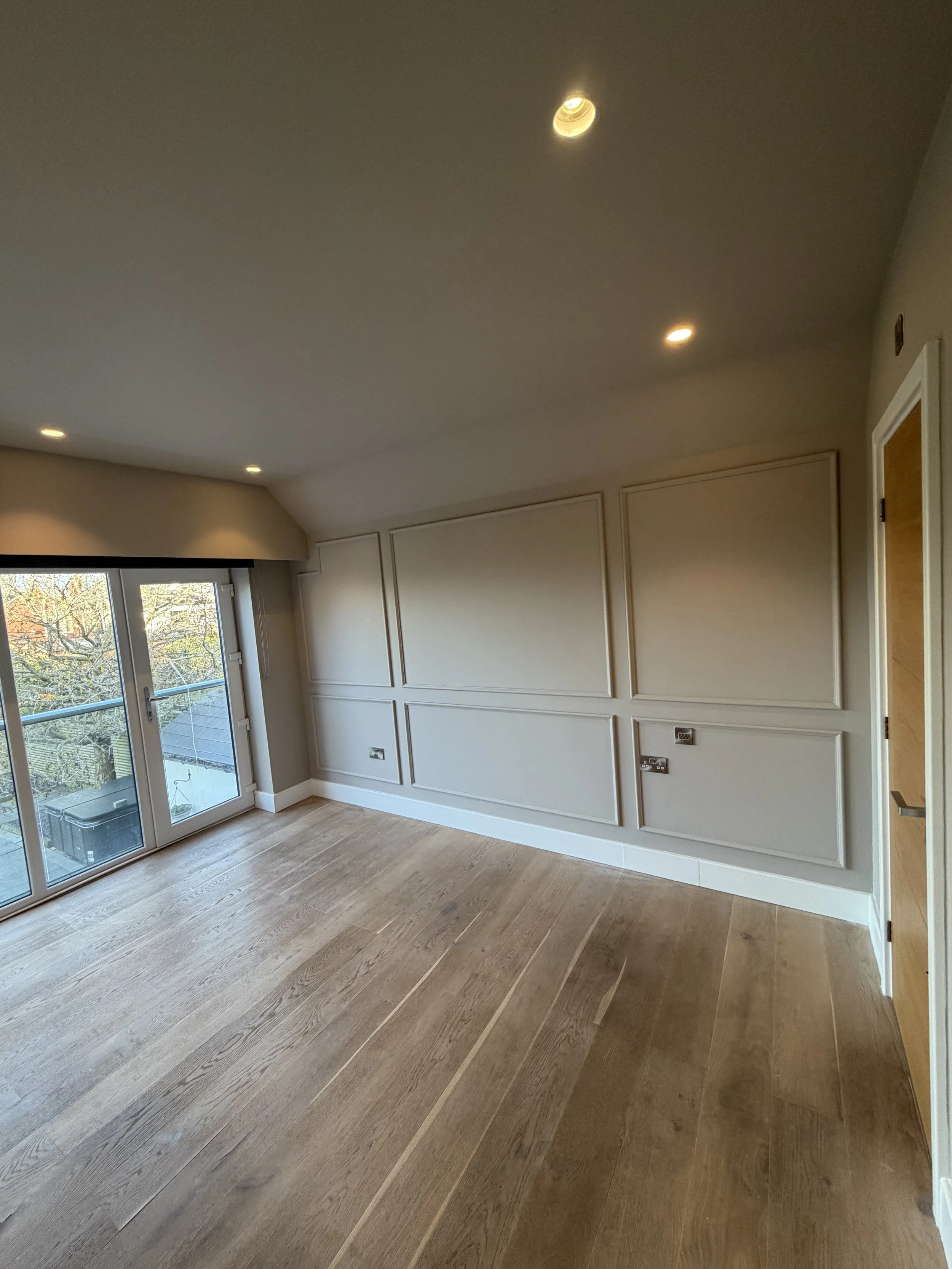 double height beaded panelling in bedroom