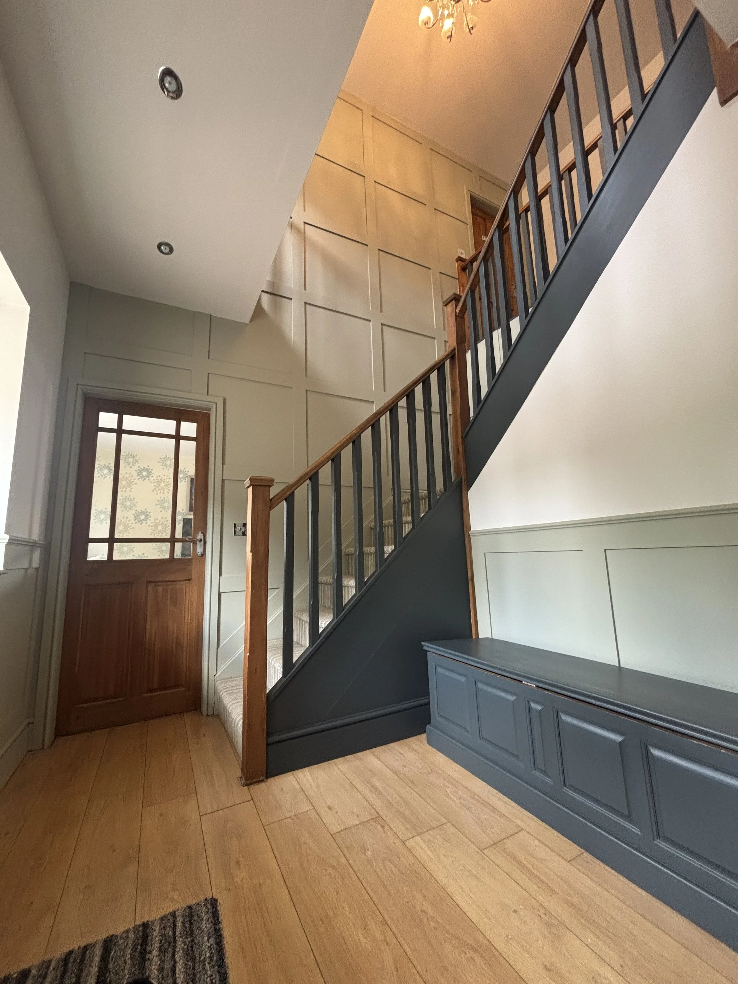 full feature wall on gallery staircase
