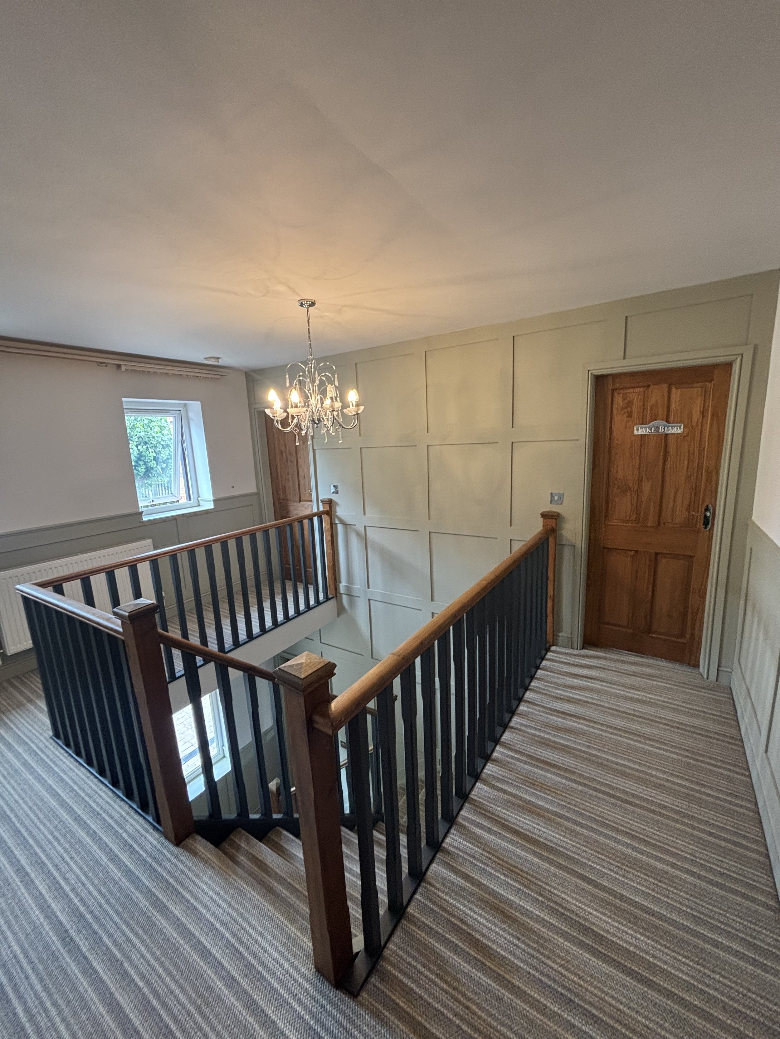 full feature wall on gallery staircase
