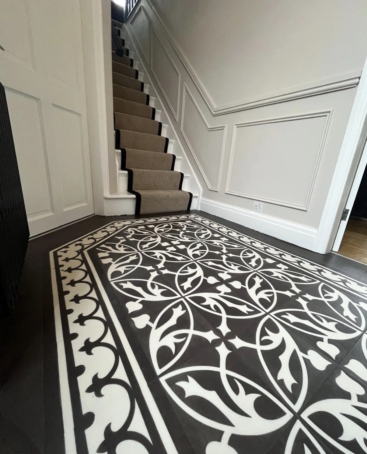Half height beaded panelling on hall stairs and landing 