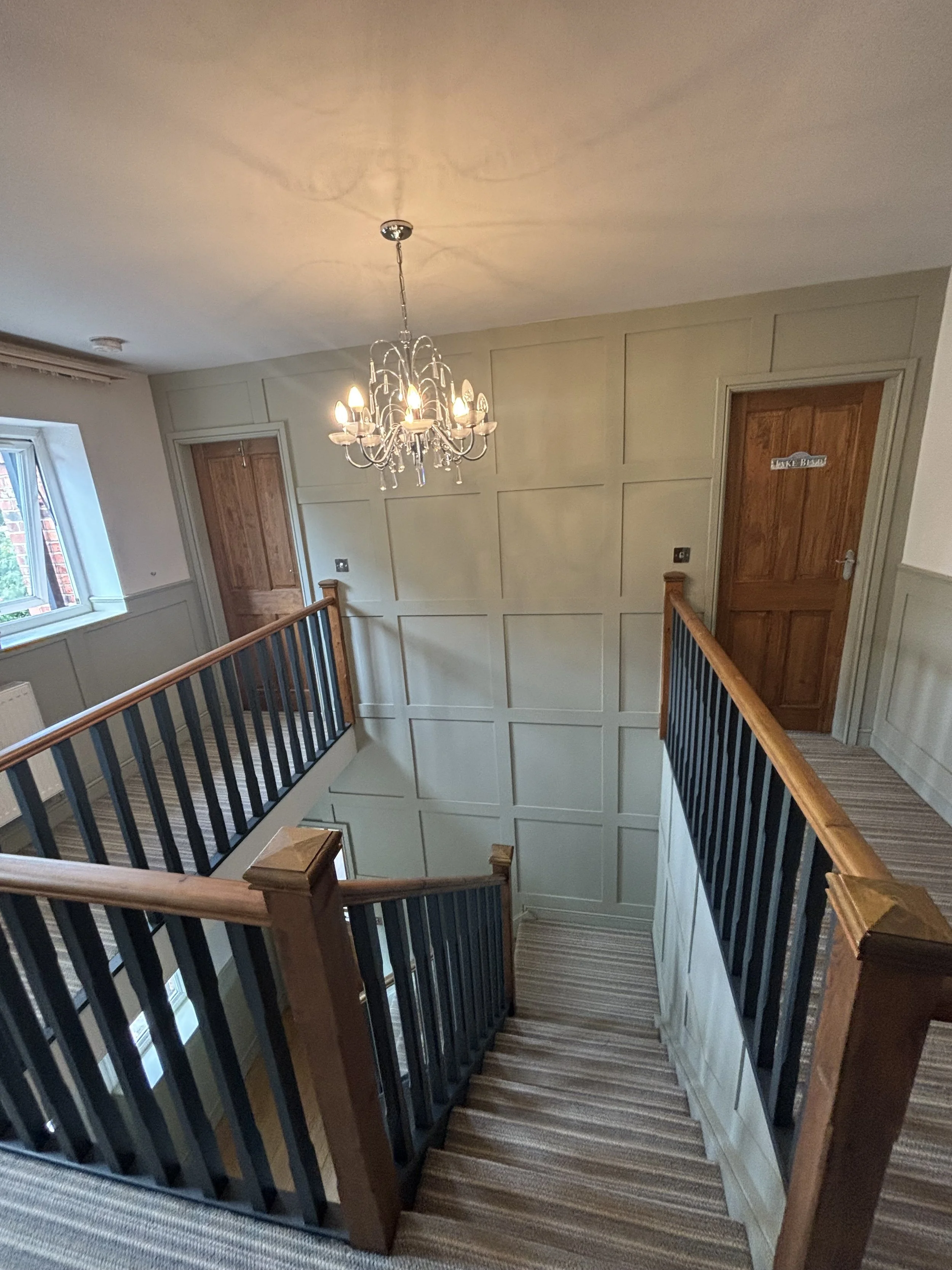 full feature wall on gallery staircase