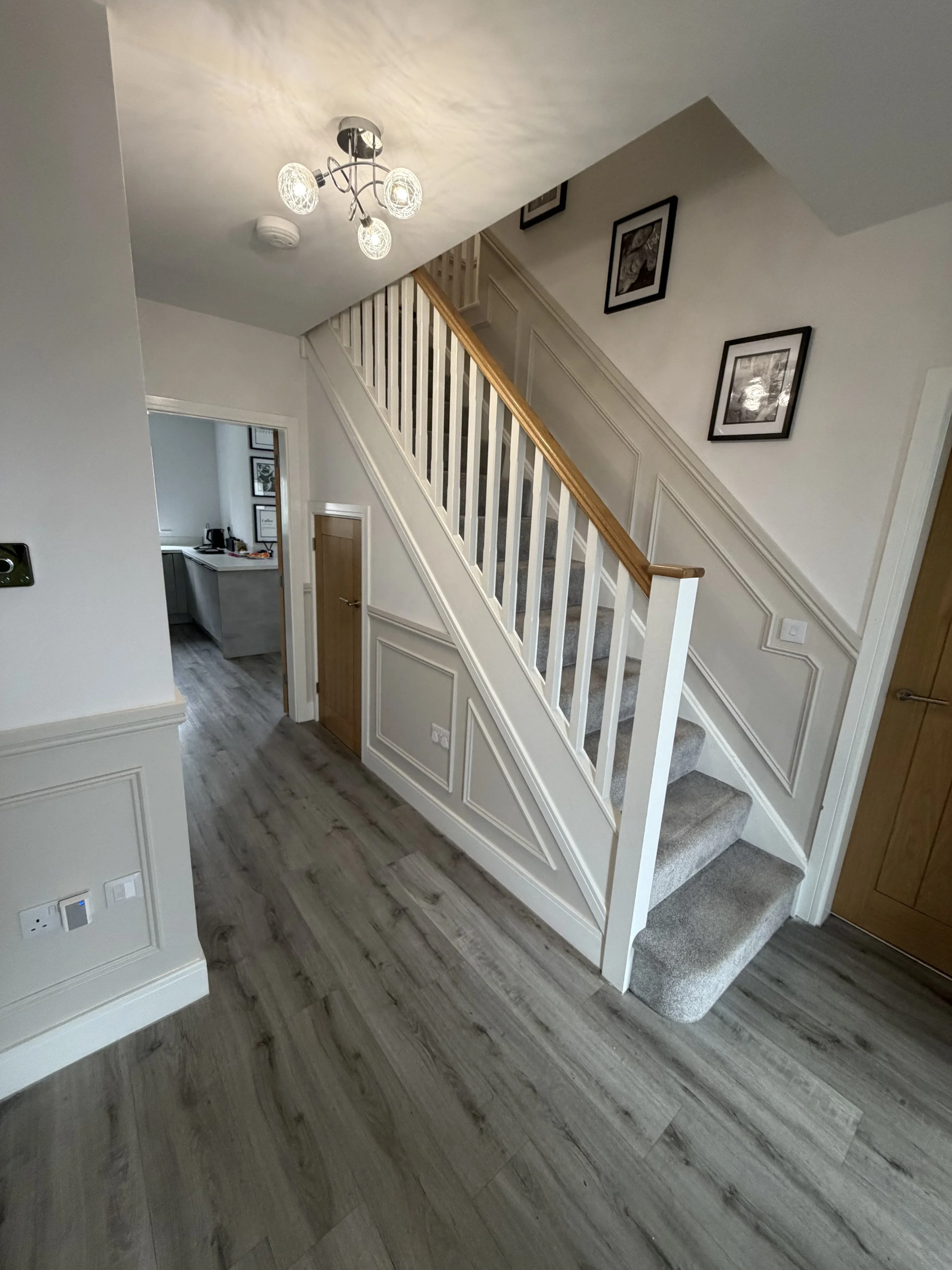 Half height beaded panelling in hall stairs and landing 