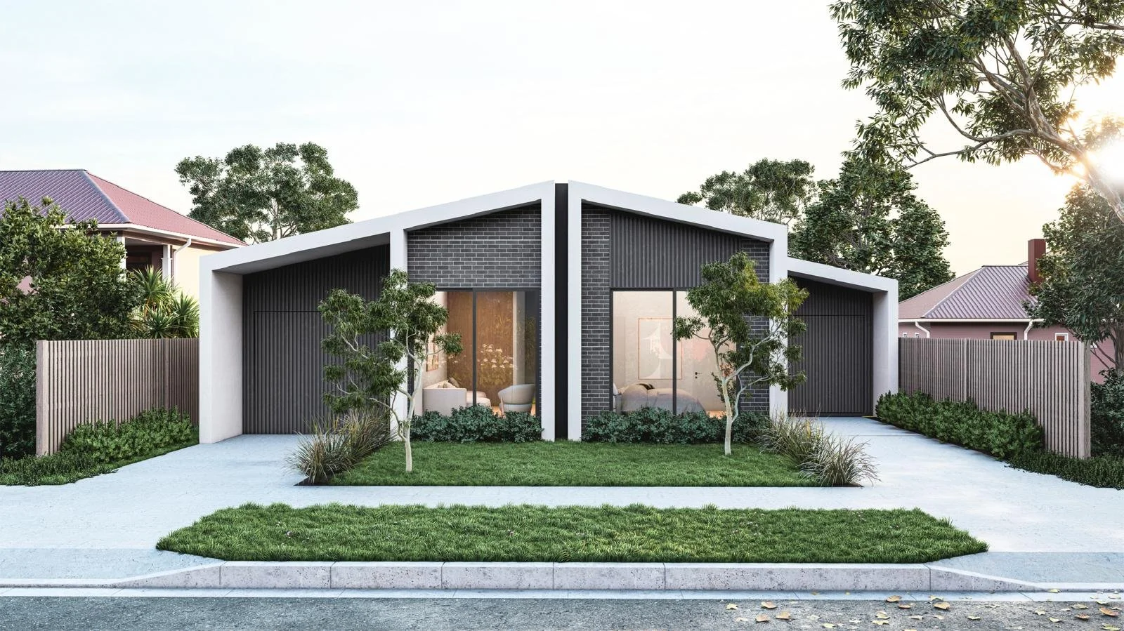 Modern single-story house with large glass windows, brick and wood exterior, situated in a lush green backyard with a patio and outdoor dining area.