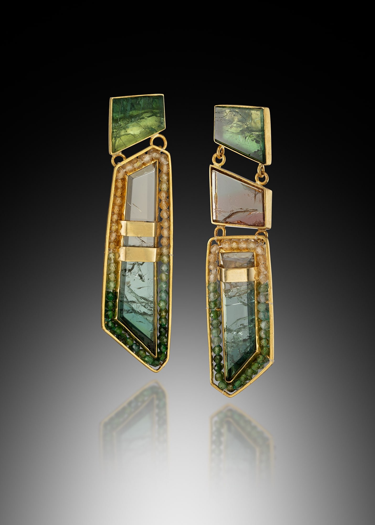 Landscape earrings. These earrings are hand woven and fabricated with tourmaline, and 20k gold beads, with tourmaline slices, set in 22k gold bezels.