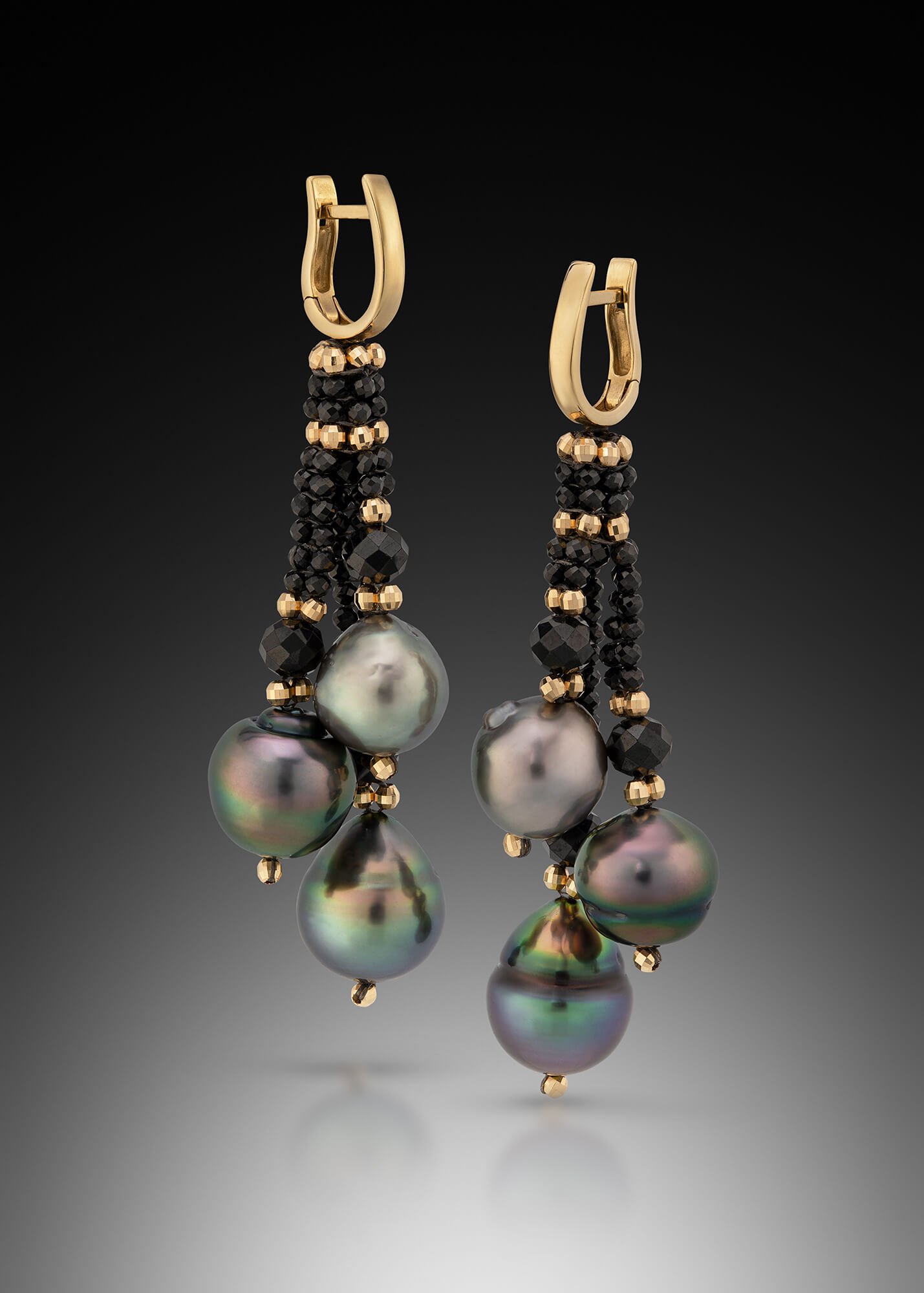 Tahitian Pearl Dangles. These earrings are hand woven of 14k gold,  black spinel beads, and Tahitian pearls.