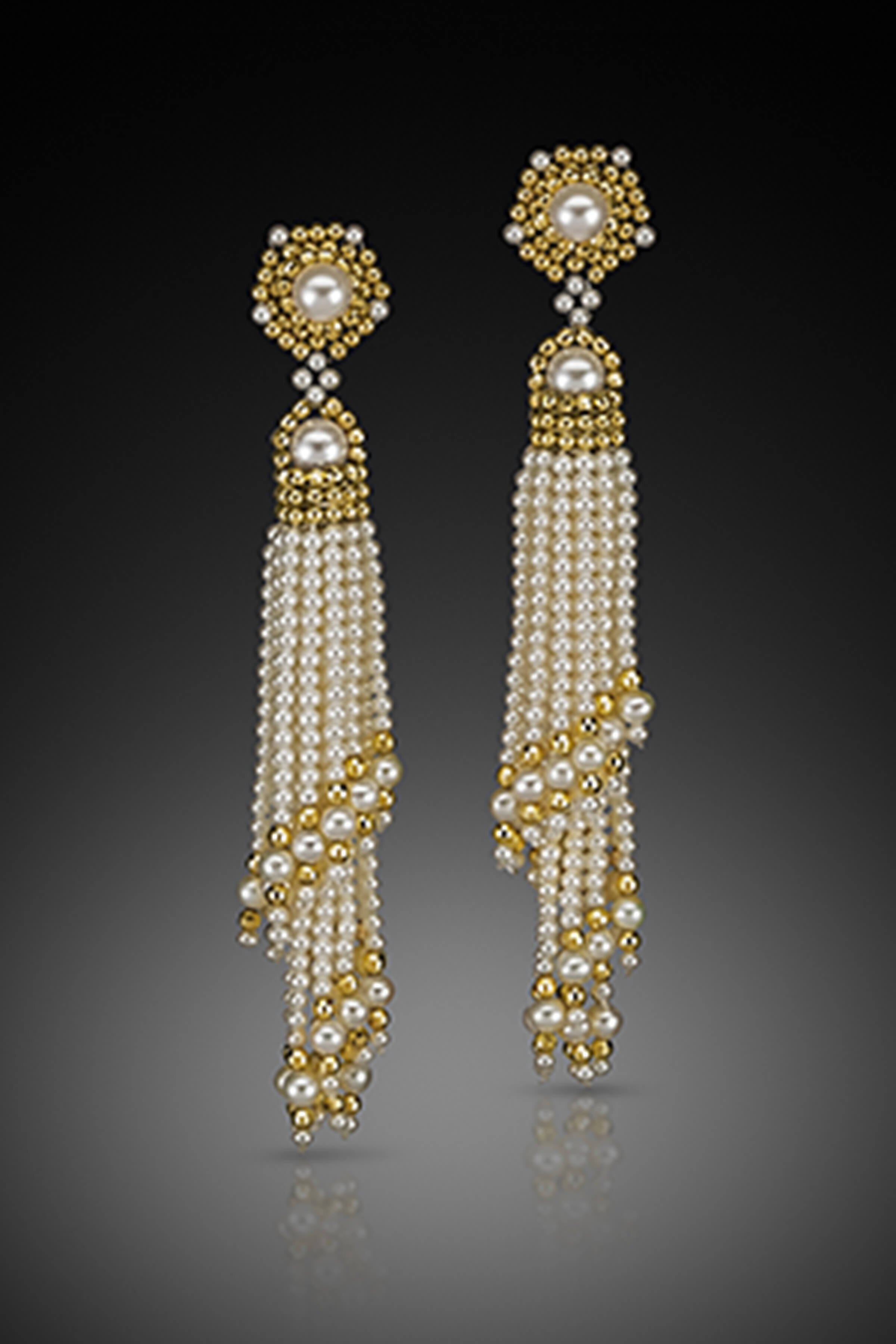 These "swirl" earrings are hand-woven of tiny freshwater pearls, and 14k gold beads.