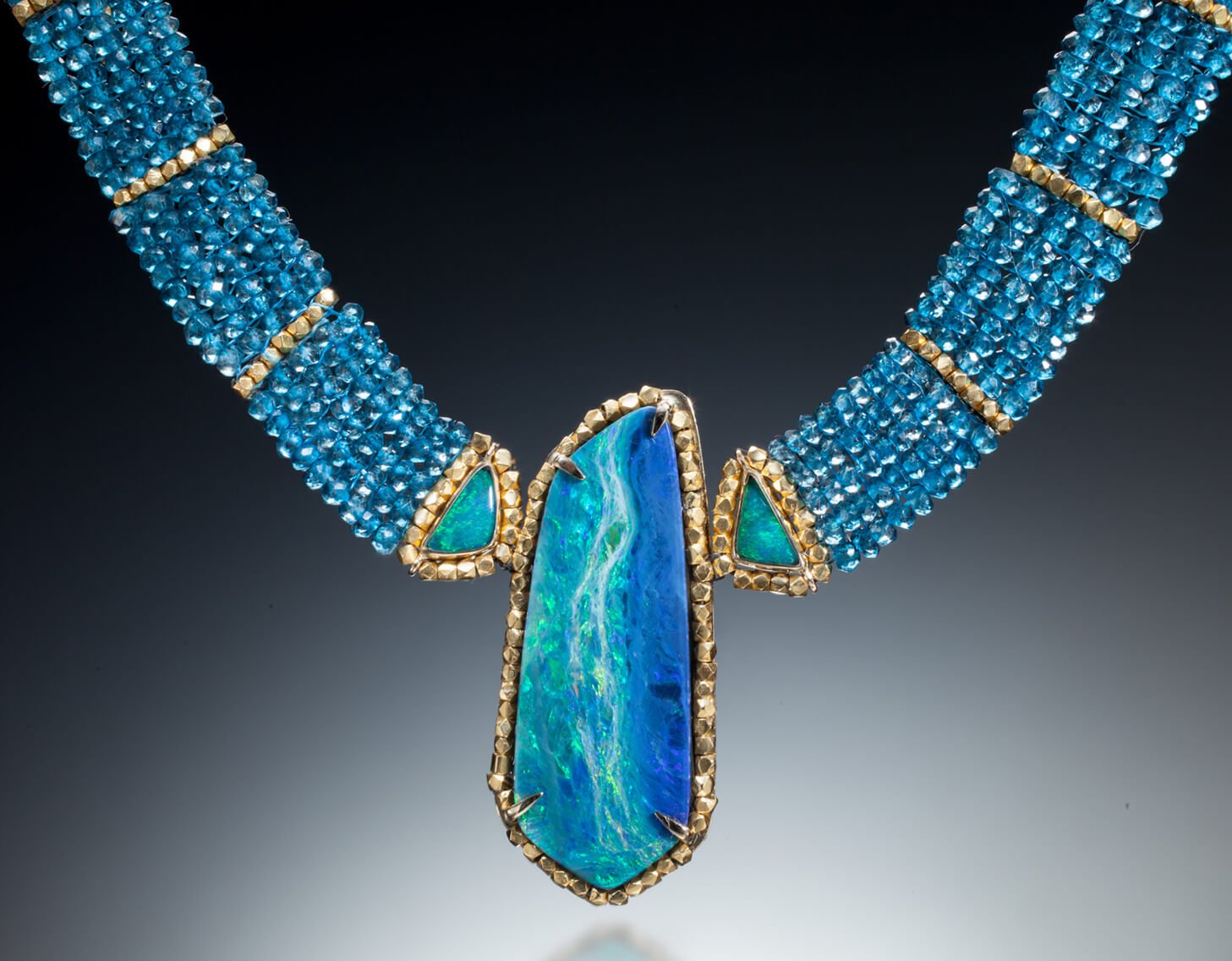 Seascape (2) This collar is hand woven of apatite and 18k gold beads. The three bezels are fabricated of 18k gold, set with three Australian opals.