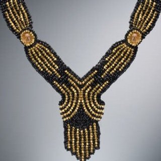 Deco Choker. This choker is hand-woven of black spinel, 18k gold, and rutilated quartz beads.