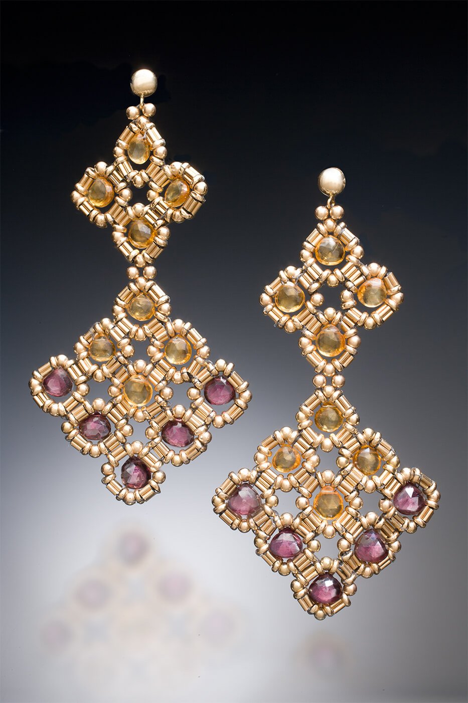 Chandelier Earrings. These long earrings are hand woven with 14k gold, citrine, and garnet beads.