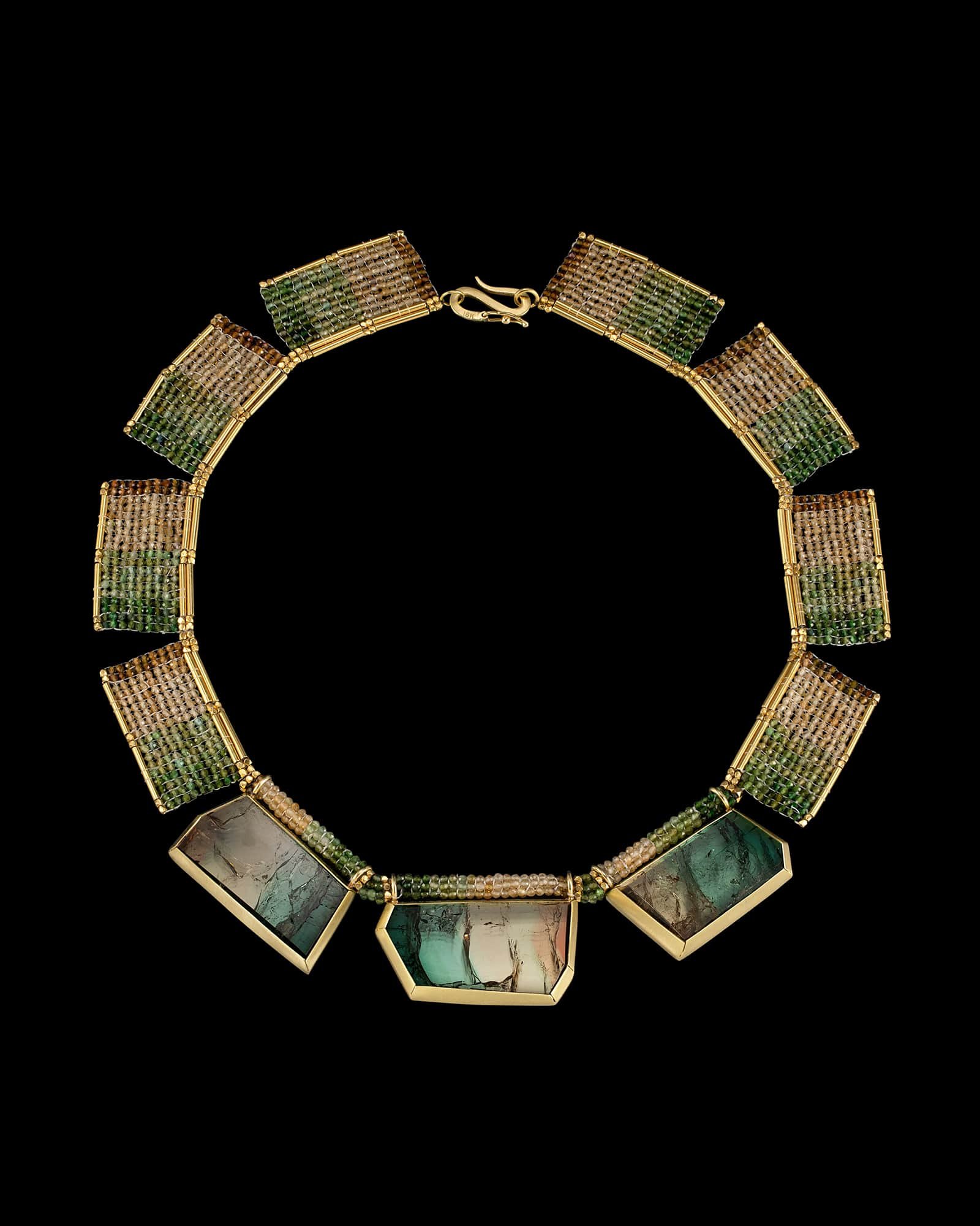 Landscape Collar (1).  Neckpiece is hand woven of multicolor tourmaline and 18k gold beads.  Bezels are hand fabricated of 18k gold, set with multicolor tourmaline slices.