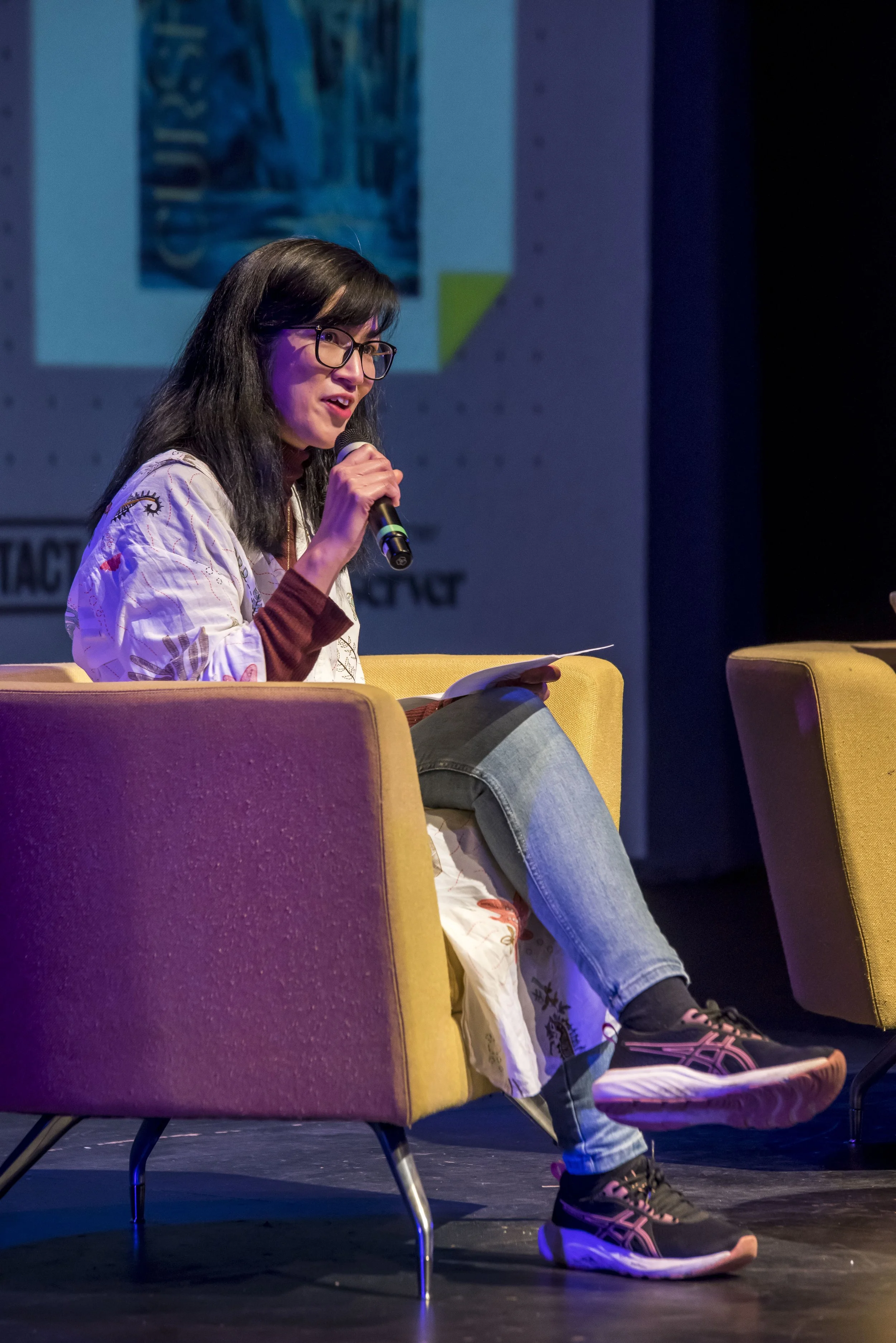 Eliza Chan speaking at Manchester Literature Festival, photo by Chris Payne