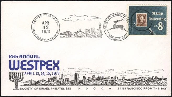 Blue 1973 WESTPEX cachet showing the San Francisco skyline including the Bay Bridge, Coit Tower, and the Transamerica Pyramid