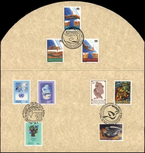 UN tri-fold souvenir folder containing United Nations Protection for Refugees stamps and new definitives