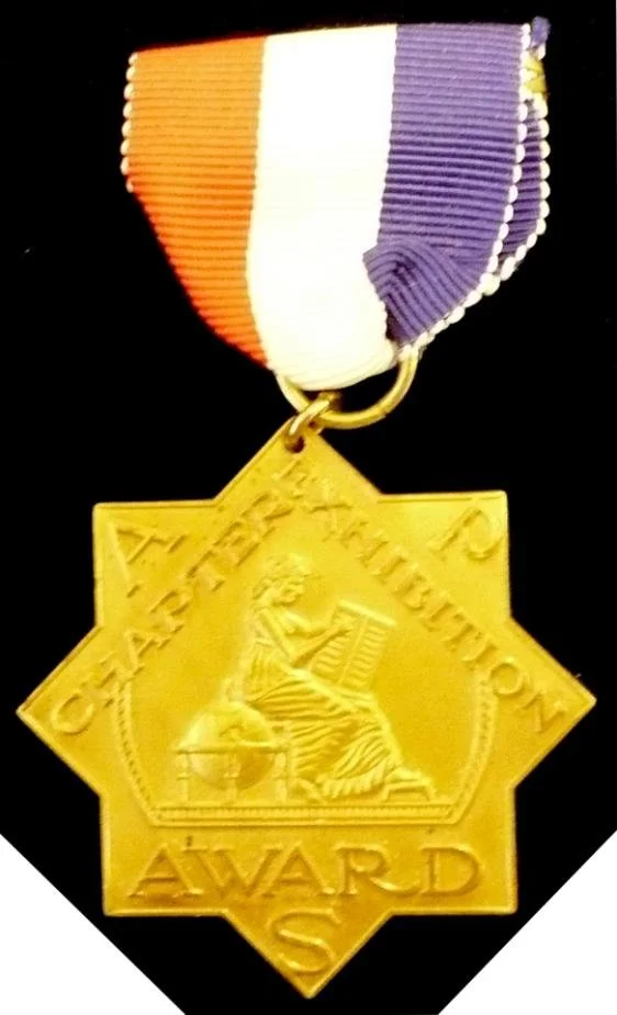 An APS Chapter gold award medal designed by Samuel Ray of Chicago