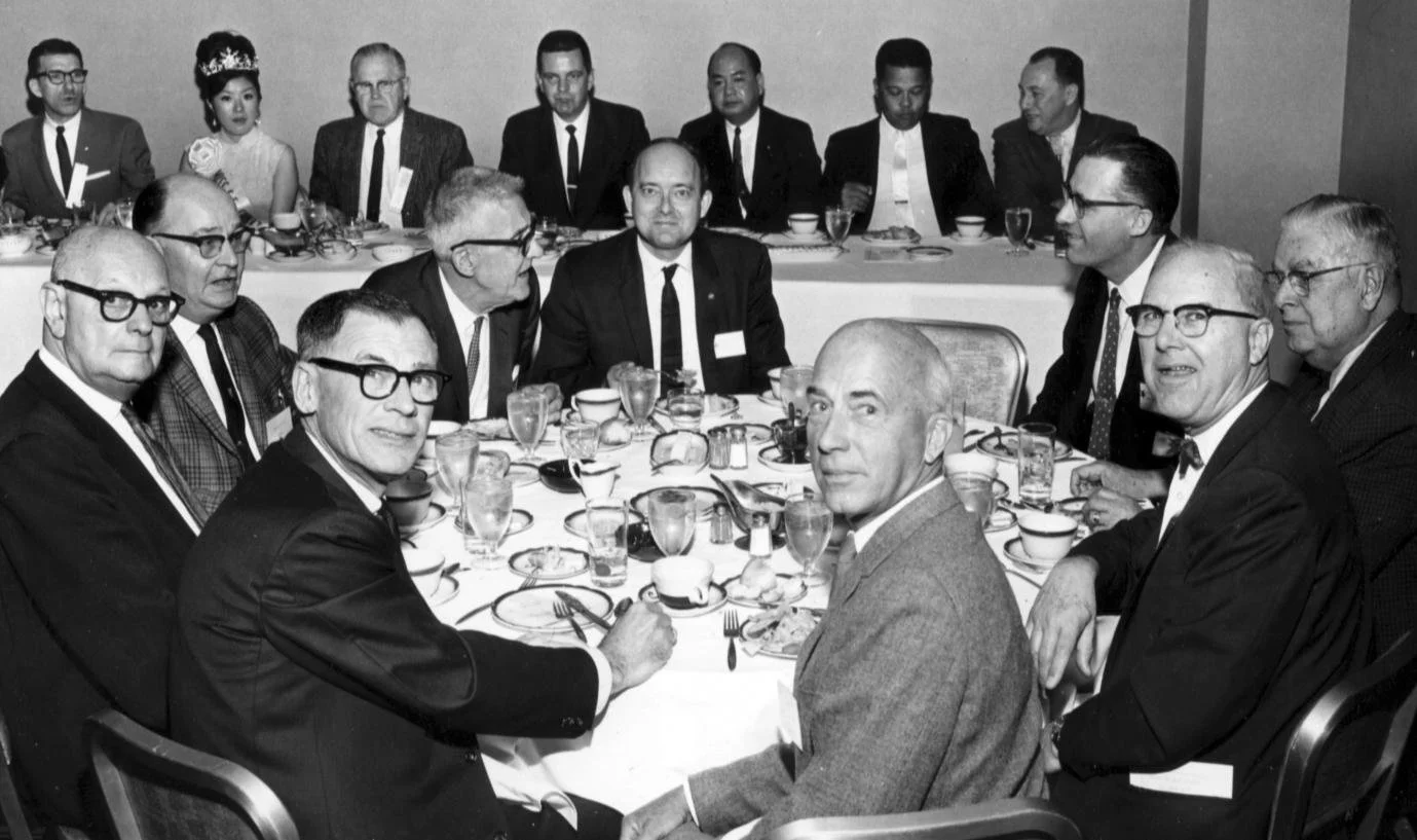 The 1966 WESTPEX Awards Banquet head table with Joseph Clary, Cyrus Thompson, Postmaster Lim P. Lee, June Gong (Miss S.F. Chinatown), and the jury members