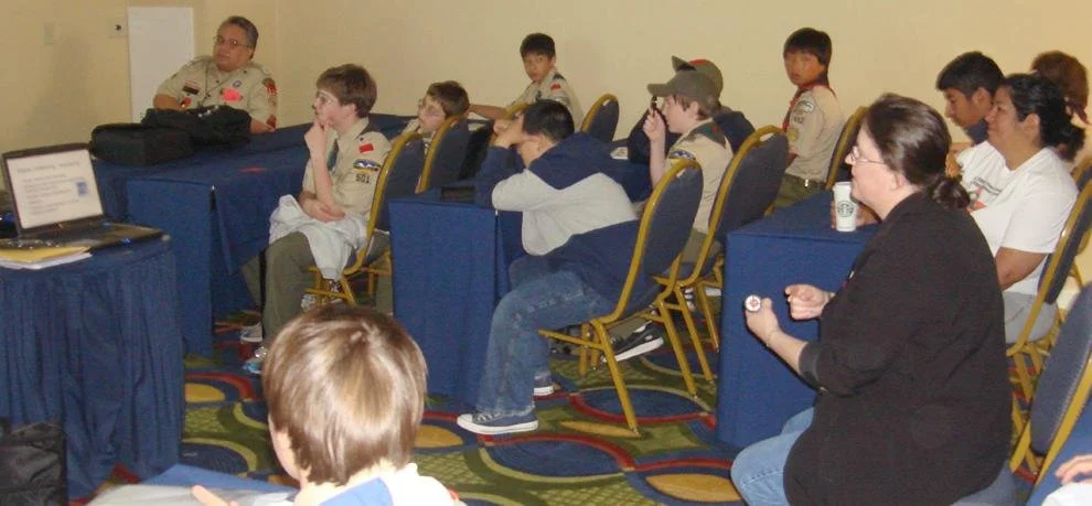 Carol Edholm conducting the Boy Scout Stamp Collecting Merit Badge Workshop