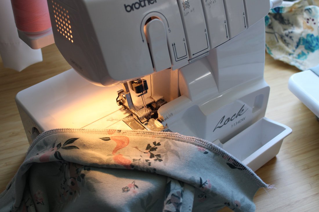 If you have a serger, serge over the raw edge.
