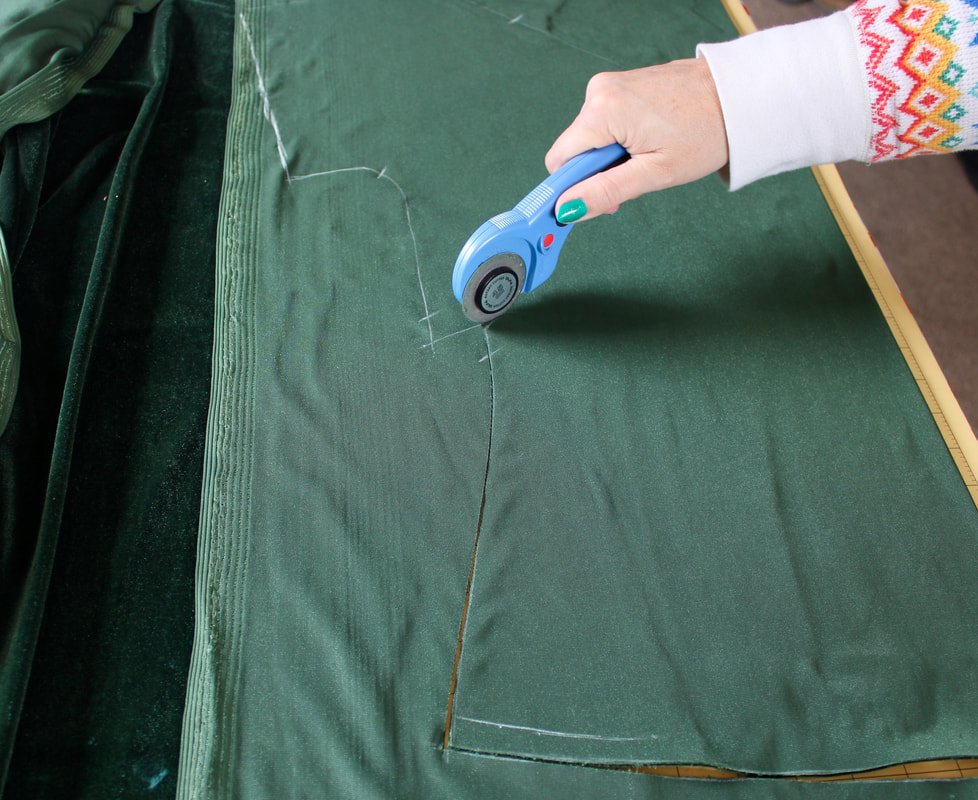 Use a rotary cutter and mat.