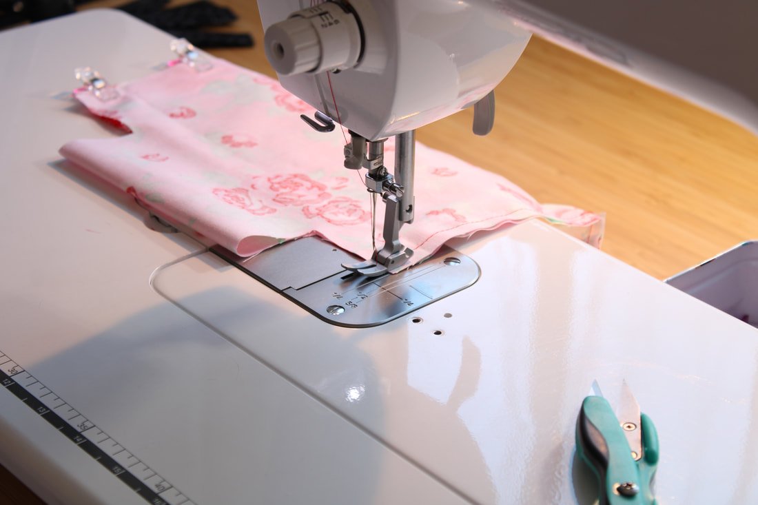 Sew down each side of the lining and outer fabrics.